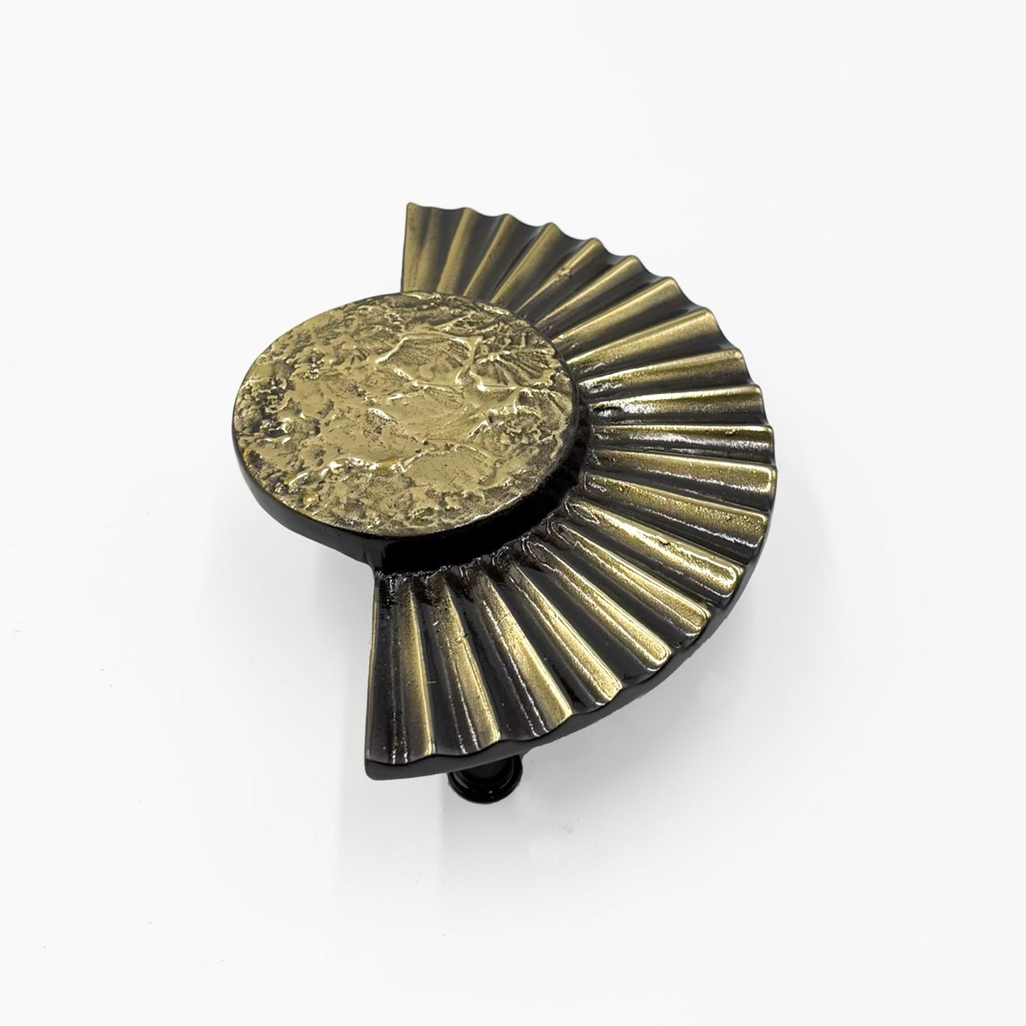 A brass cabinet pull handles designed with a sun motif, featuring a circular design with rayed edges-on a white background.