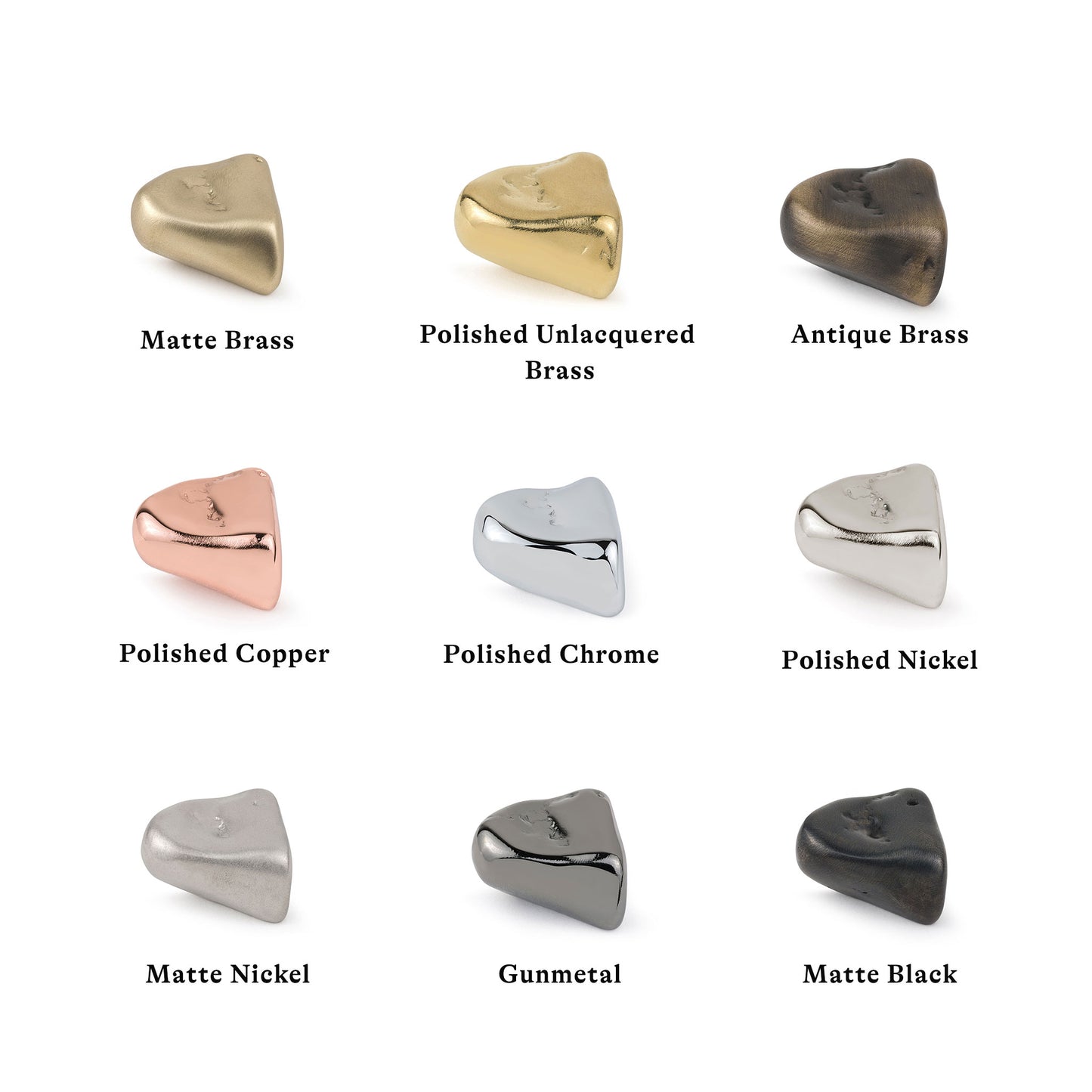 Collection of stone-shaped cabinet pulls in various finishes on a white background