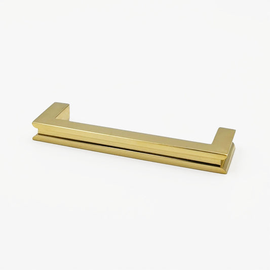 Brass Long cabinet handle on a white background