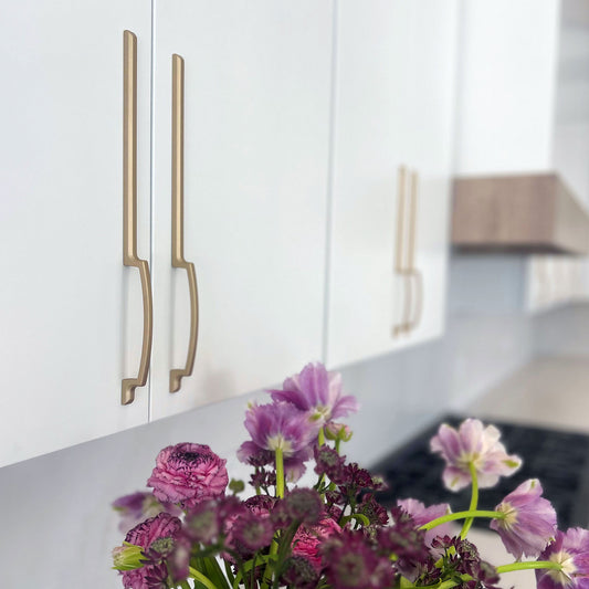 Midcentury Lon Arm Asymmetrical pulls installed