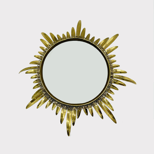 Convex Mirror framed by starburst brass pattern