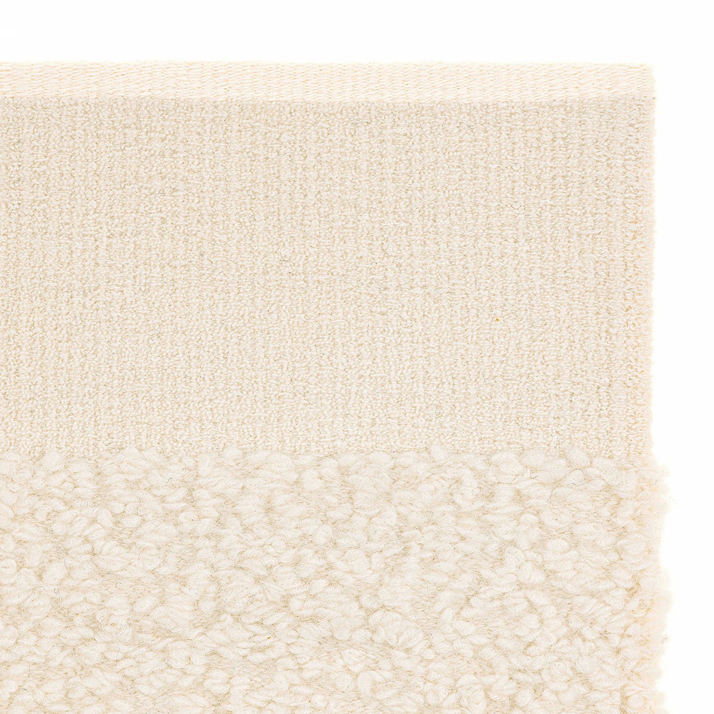 prado rug style in cream colored woven boucle and flat weave