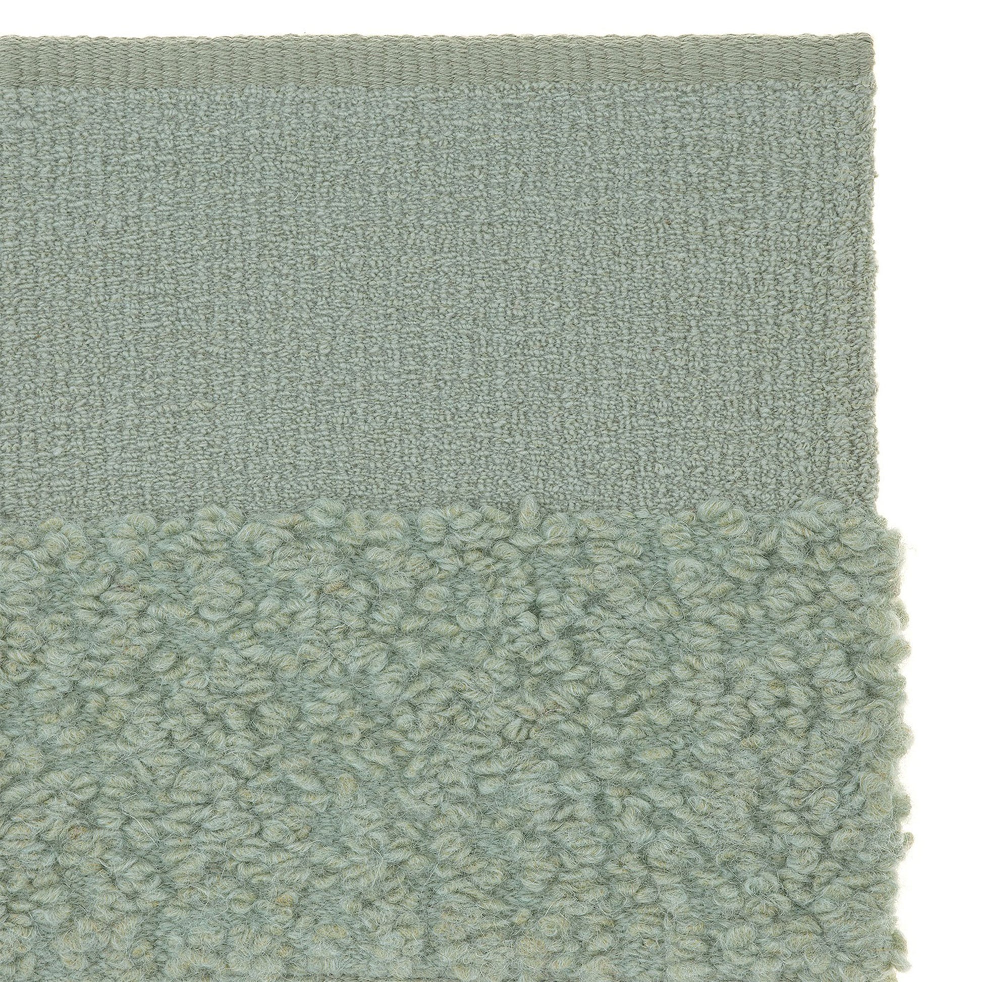 prado rug style in sage green colored woven boucle and flat weave