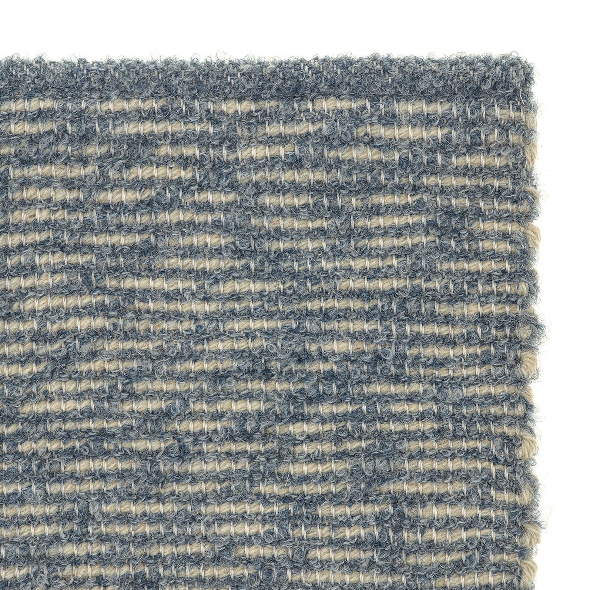 Alisso rug style in cream and smoke blue textured flat weave