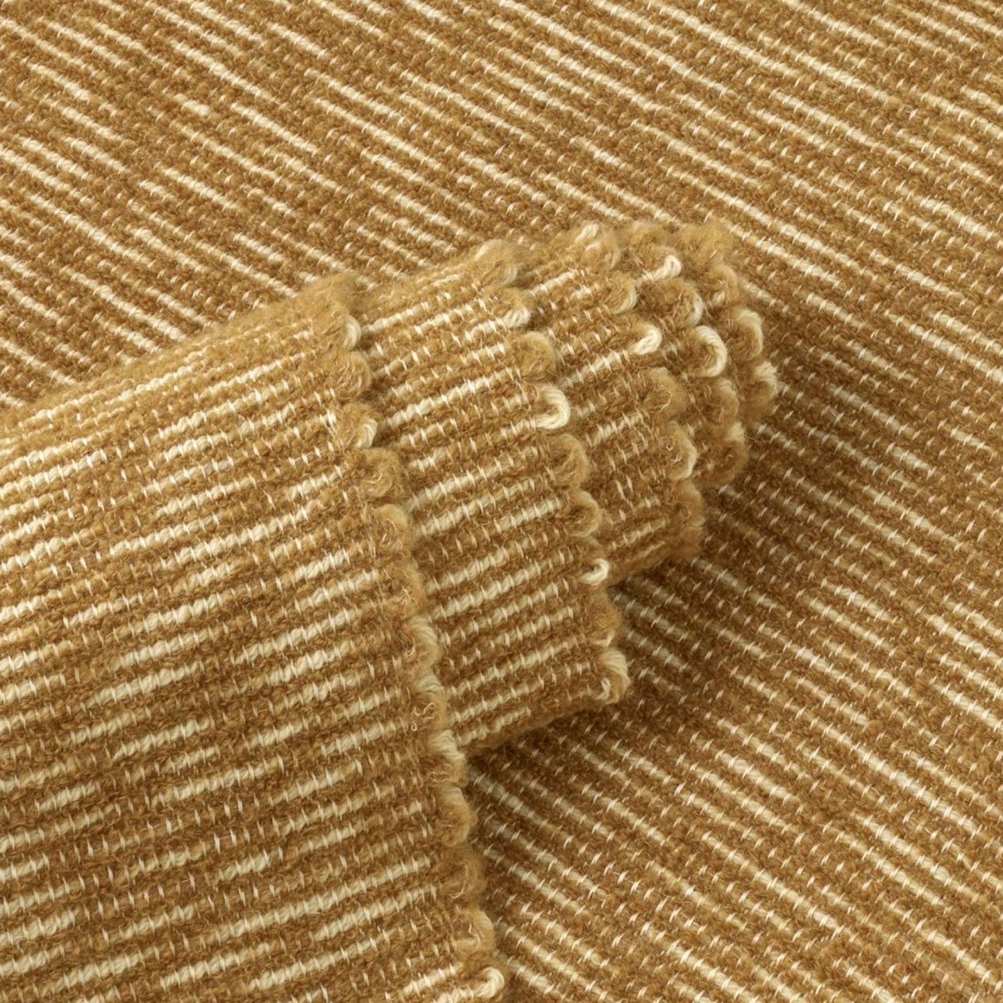 Close up of Alisso rug style in cream and deep mustard textured flat weave