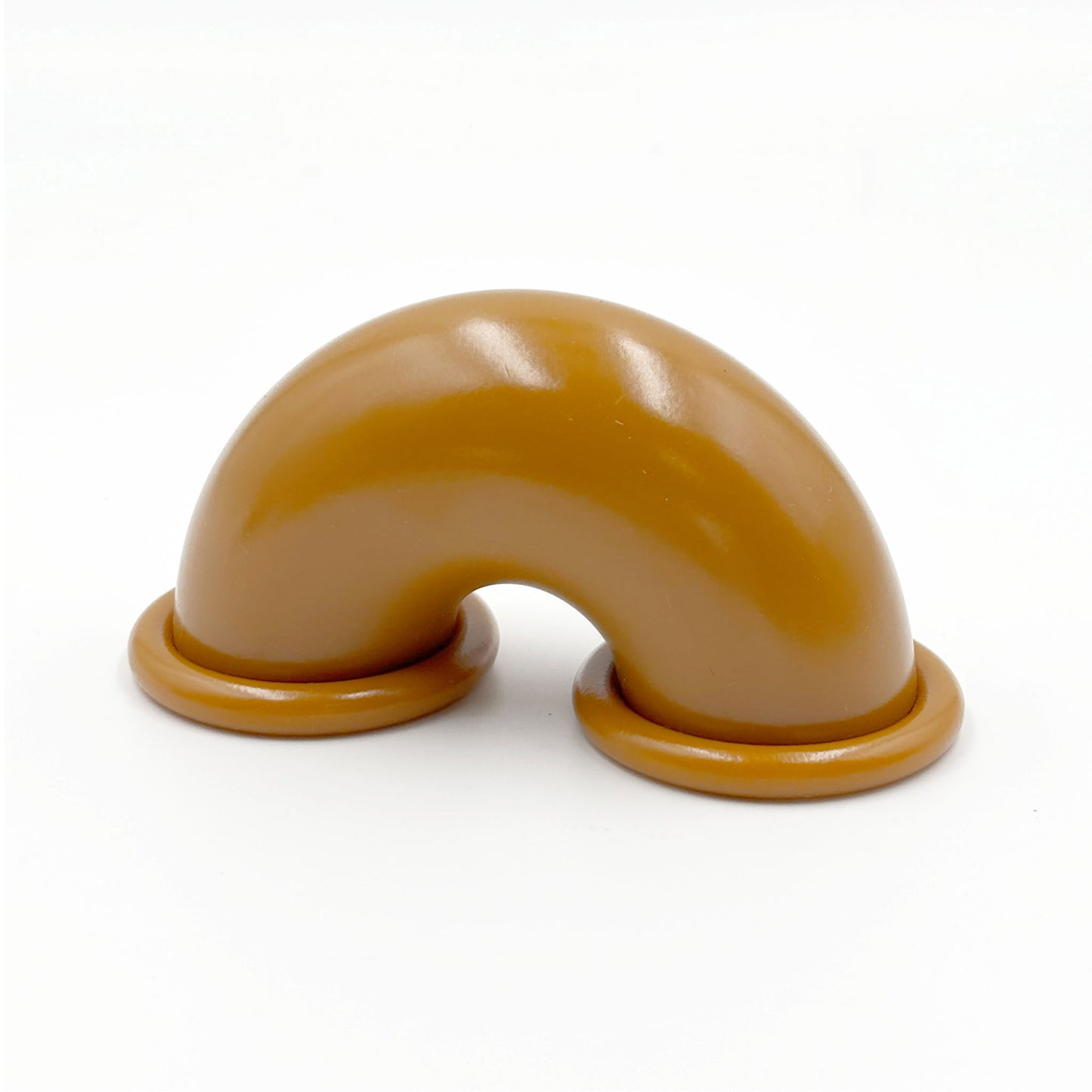 caramel colored macaroni-shaped handles on a white background