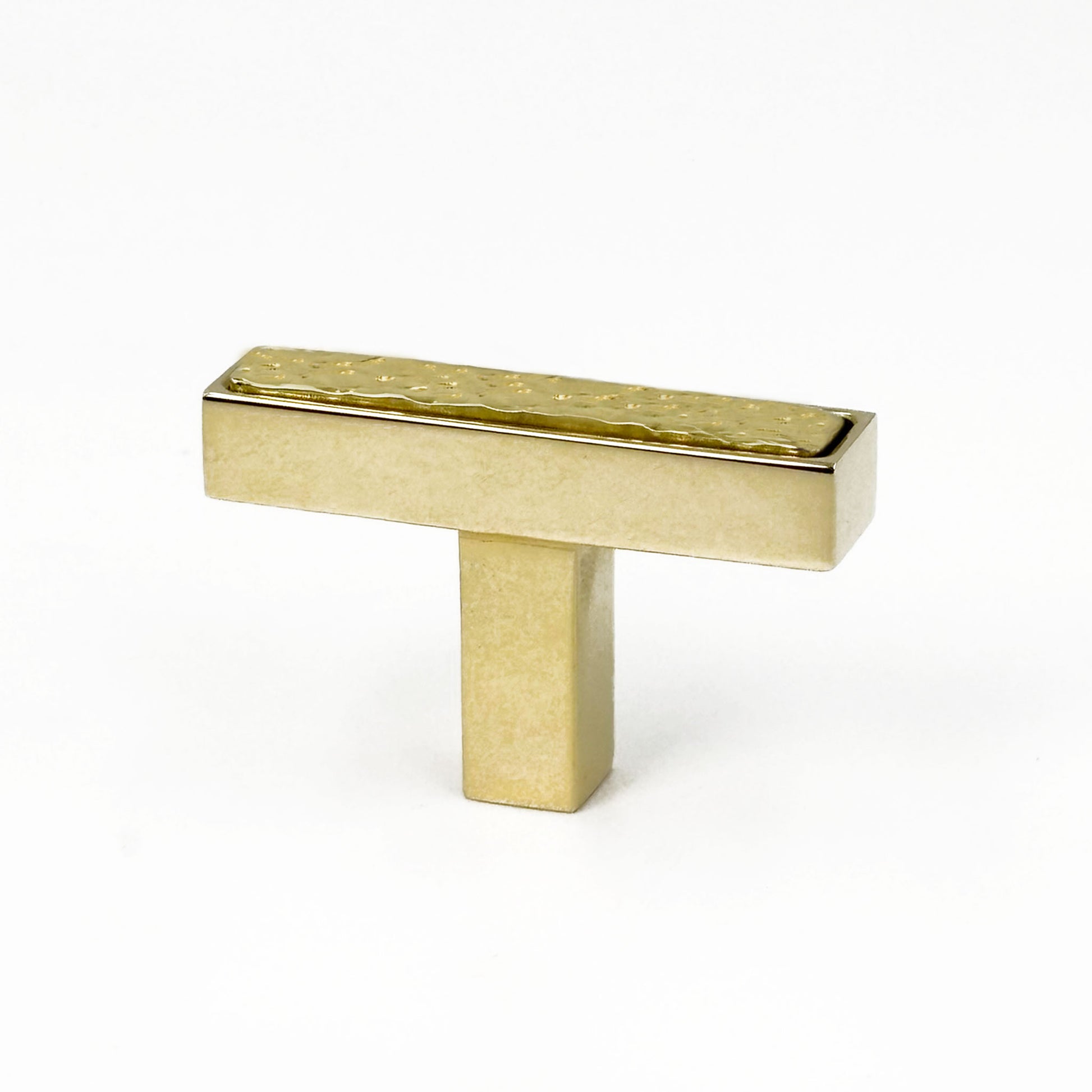 Brass rectangular cabinet tpull on a white background