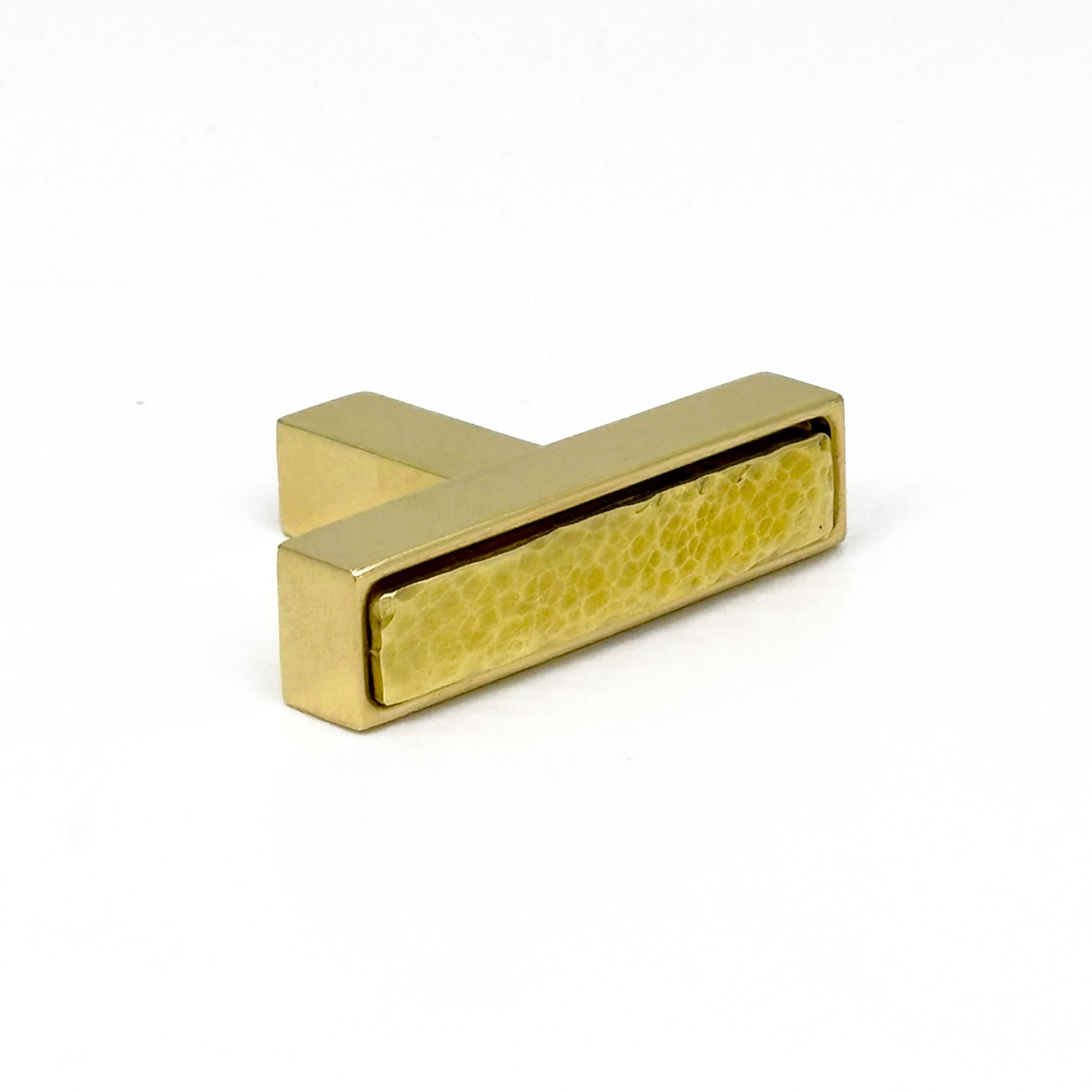 Brass rectangular cabinet tpull on a white background