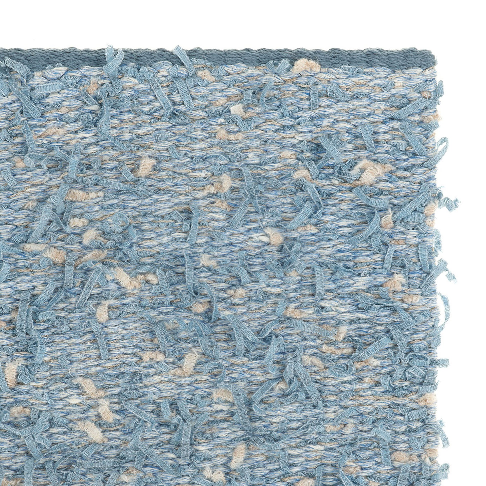 Bentu rug style in mixed pale blue and cream colored eyelash textured flat weave