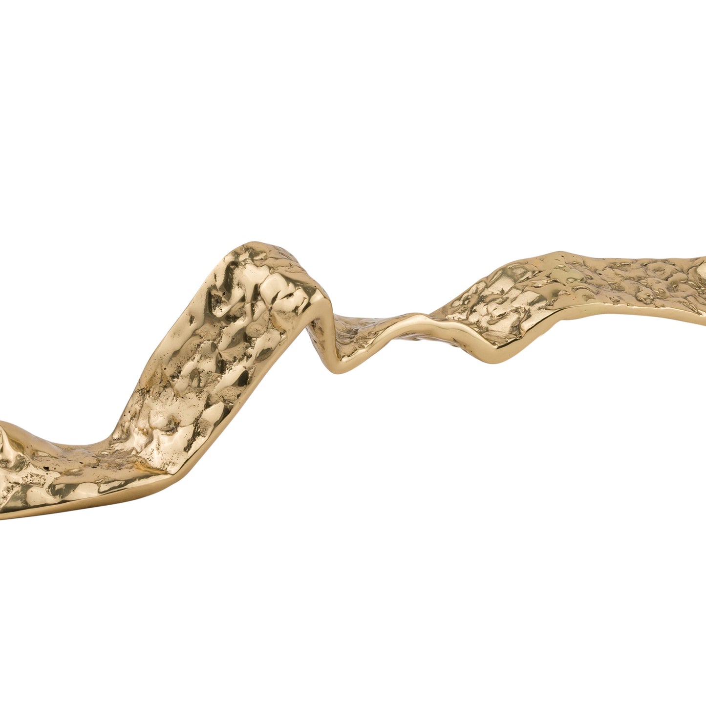 close up of a Brass cabinet hardware piece with wavy design on a white background