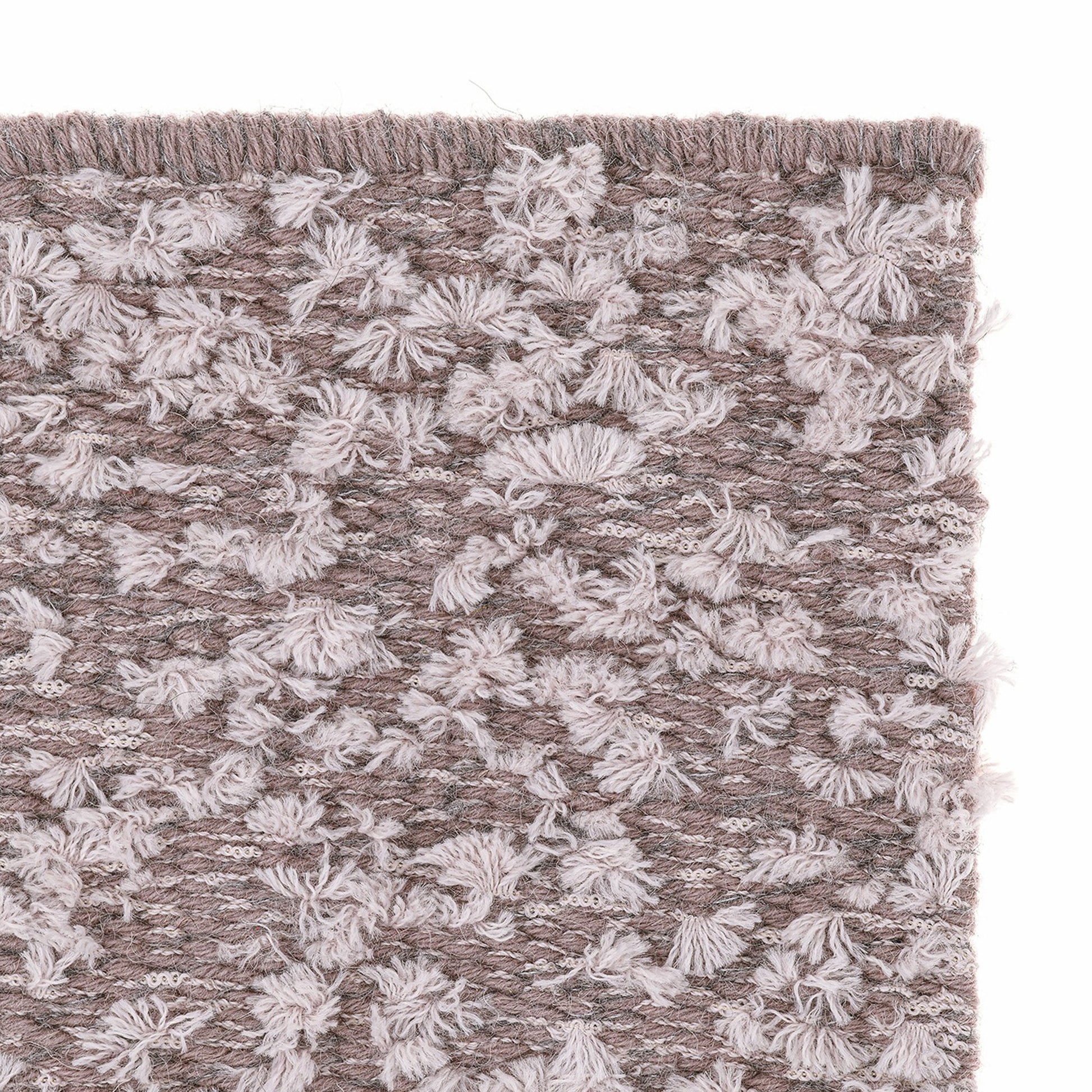 Cardu rug style in mixed taupe colored tufted flat weave