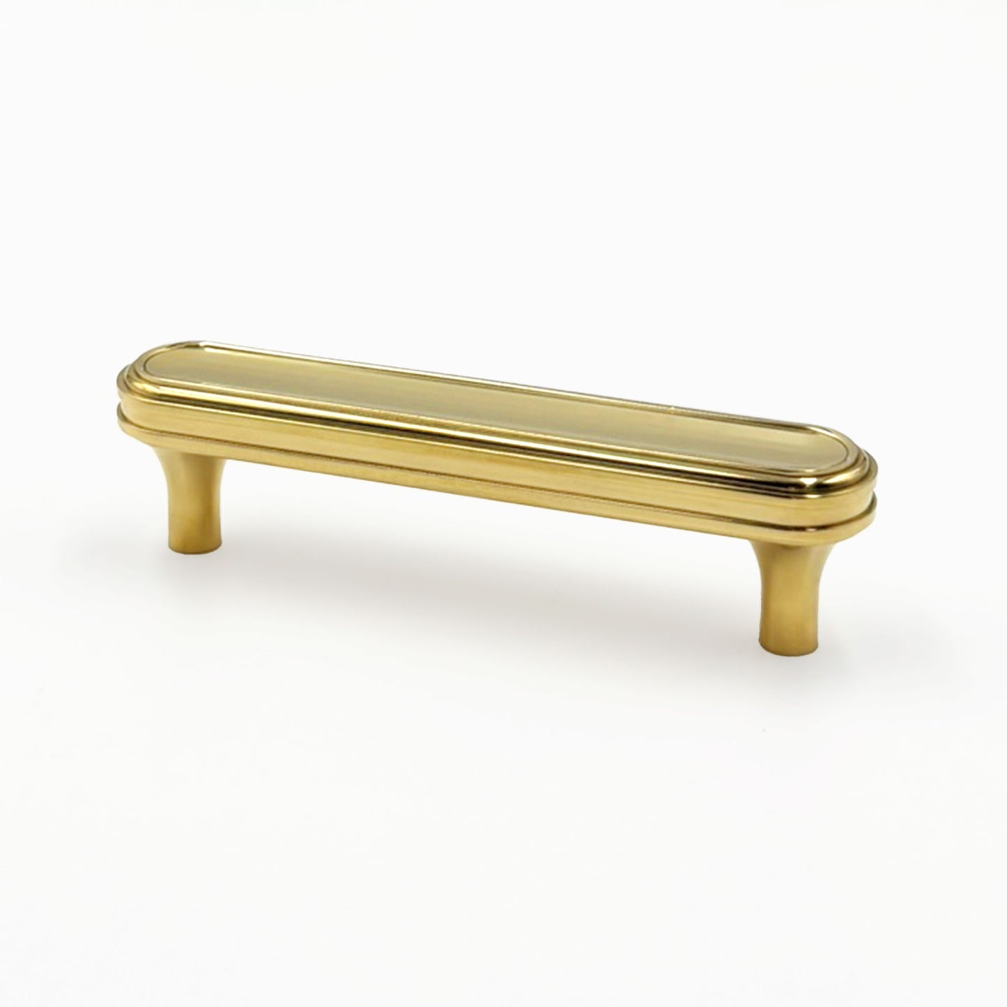 unlacquered brass turned cabinet handles on a white 