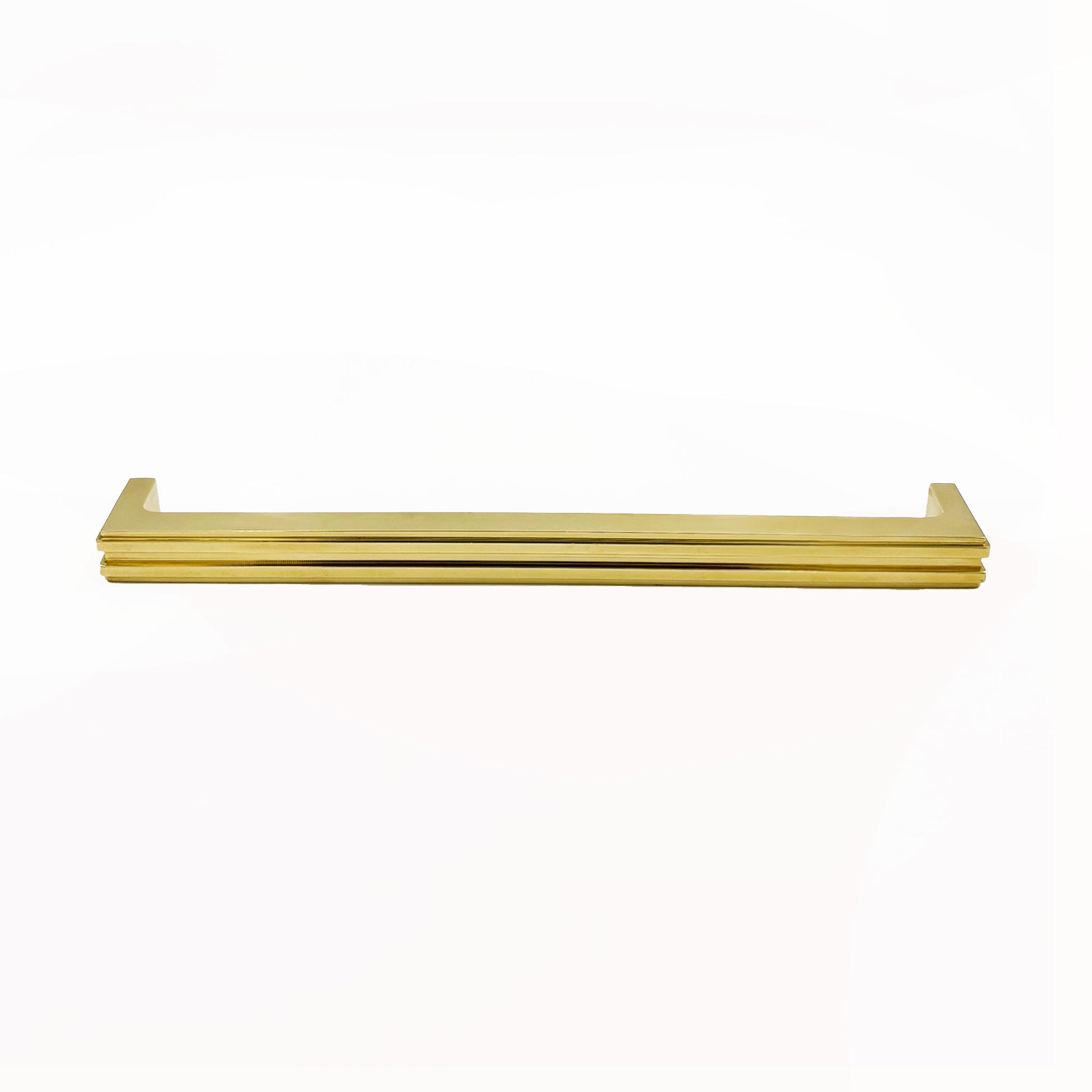 Brass cabinet handle on a white background