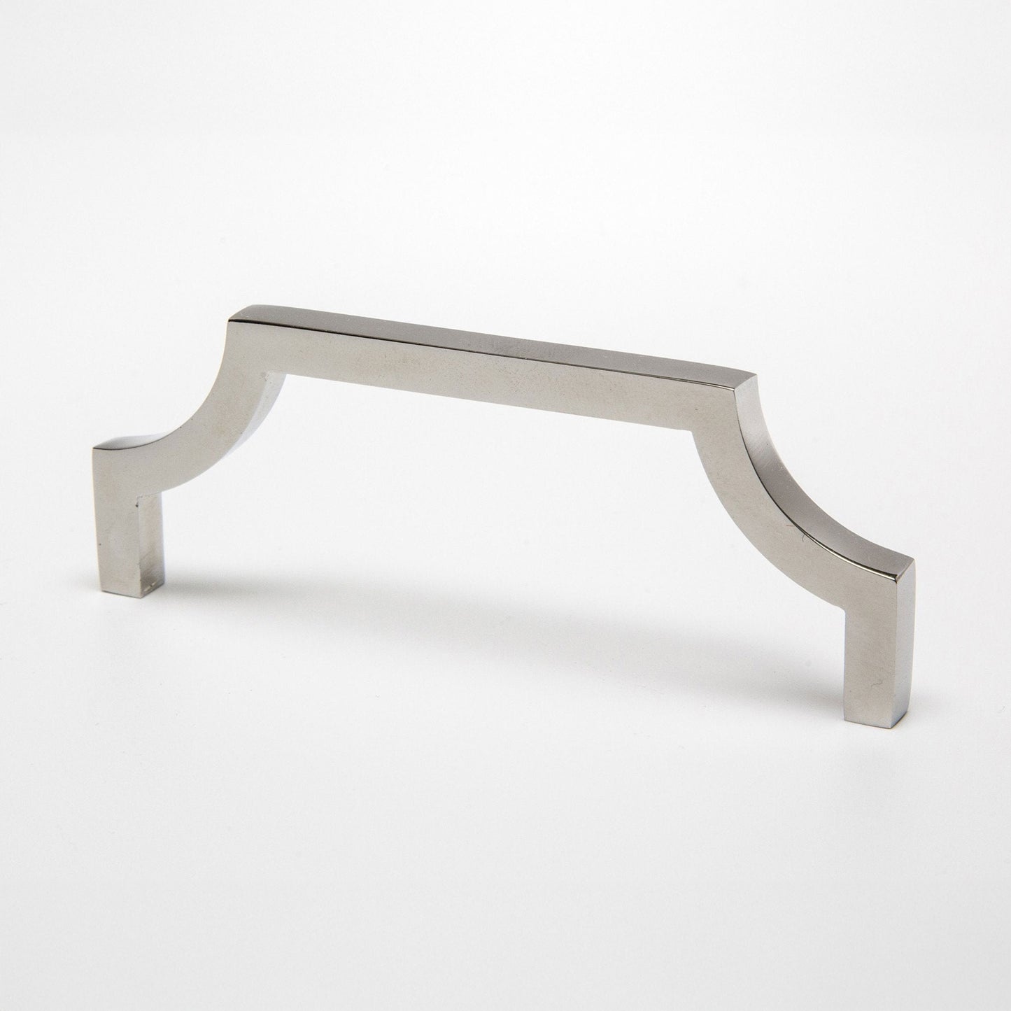 A polished nickel cabinet pull handle with a curved corner design on a clean white background.