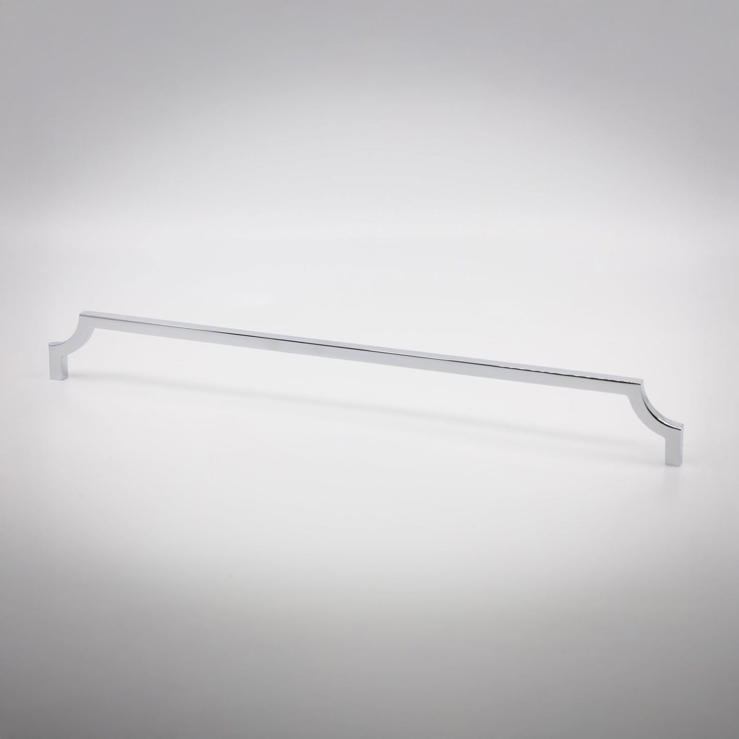 A long, slender cabinet pull handle with decorative scrolled ends, finished in a polished chrome, shown on a clean light gray background.