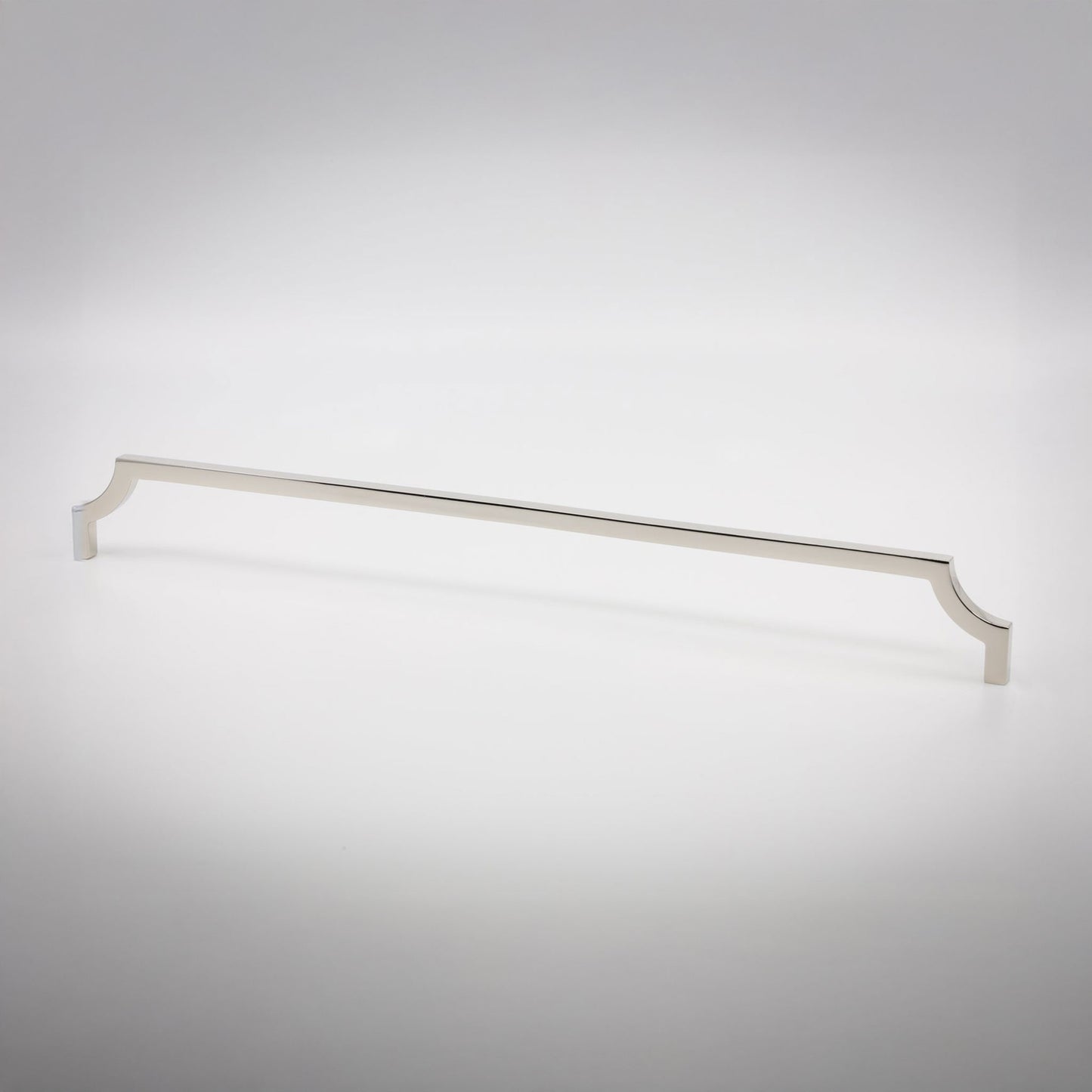 A long, slender cabinet pull handle with decorative scrolled ends, finished in a polished nickel, shown on a clean light gray background.