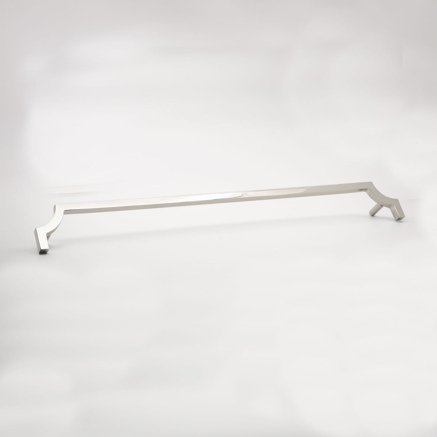 A long, slender cabinet pull in a polished nickel finish shown against a neutral background.