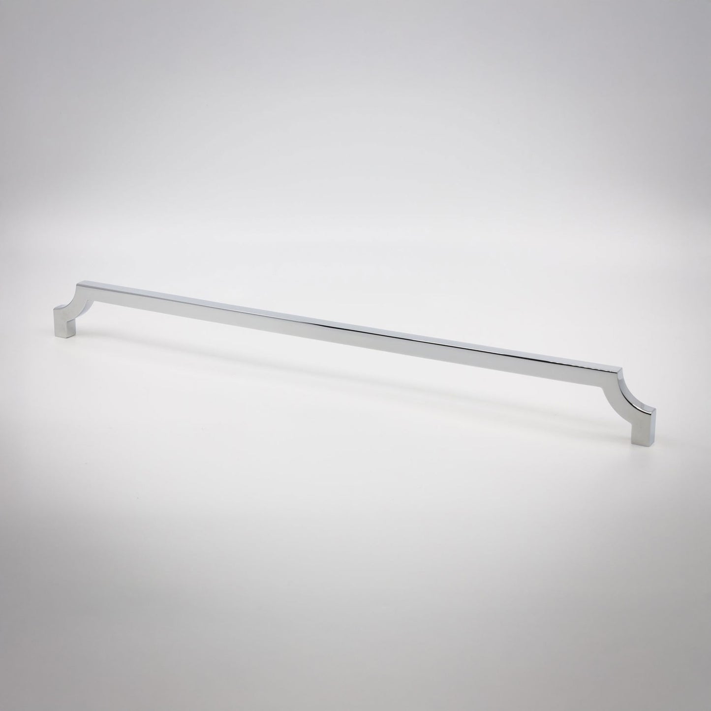 A long, slender cabinet pull in a polished chrome finish shown against a neutral background.
