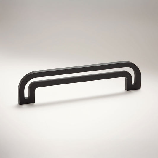 Arch shaped linear cabinet pull with cut our internal area on a grey background