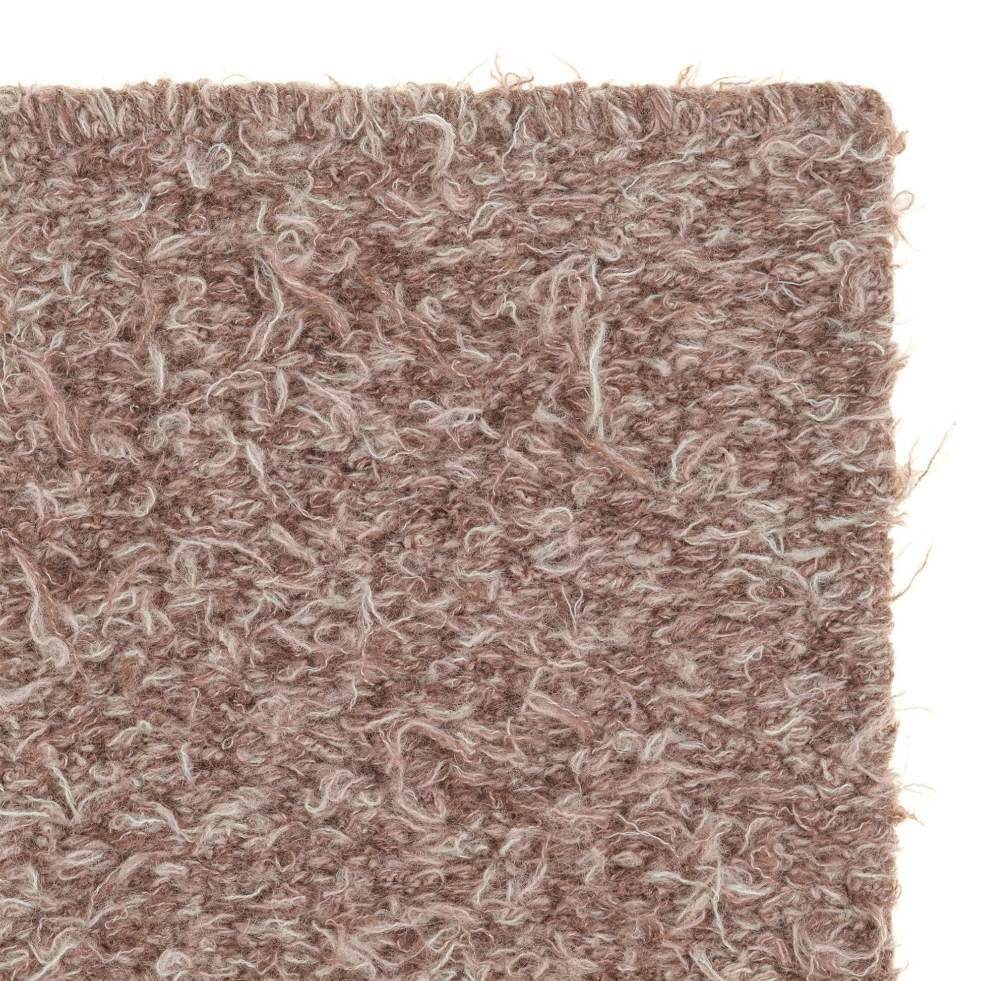 Erbe rug style in pinky taupe colored woven shag weave