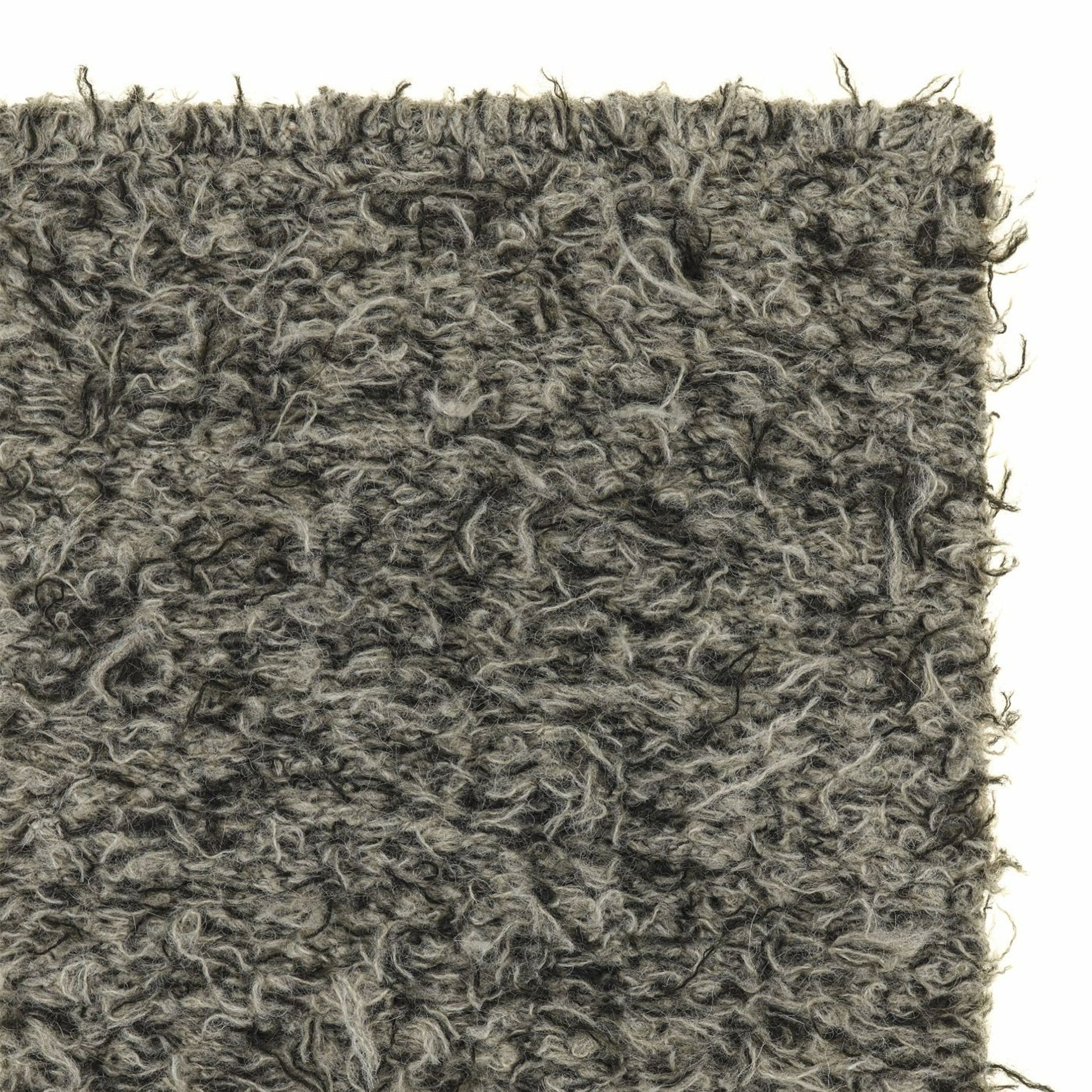 Erbe rug style in black and buff colored woven shag weave