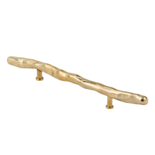 a brass orgabic ego large pull shown from the side angle on a white background