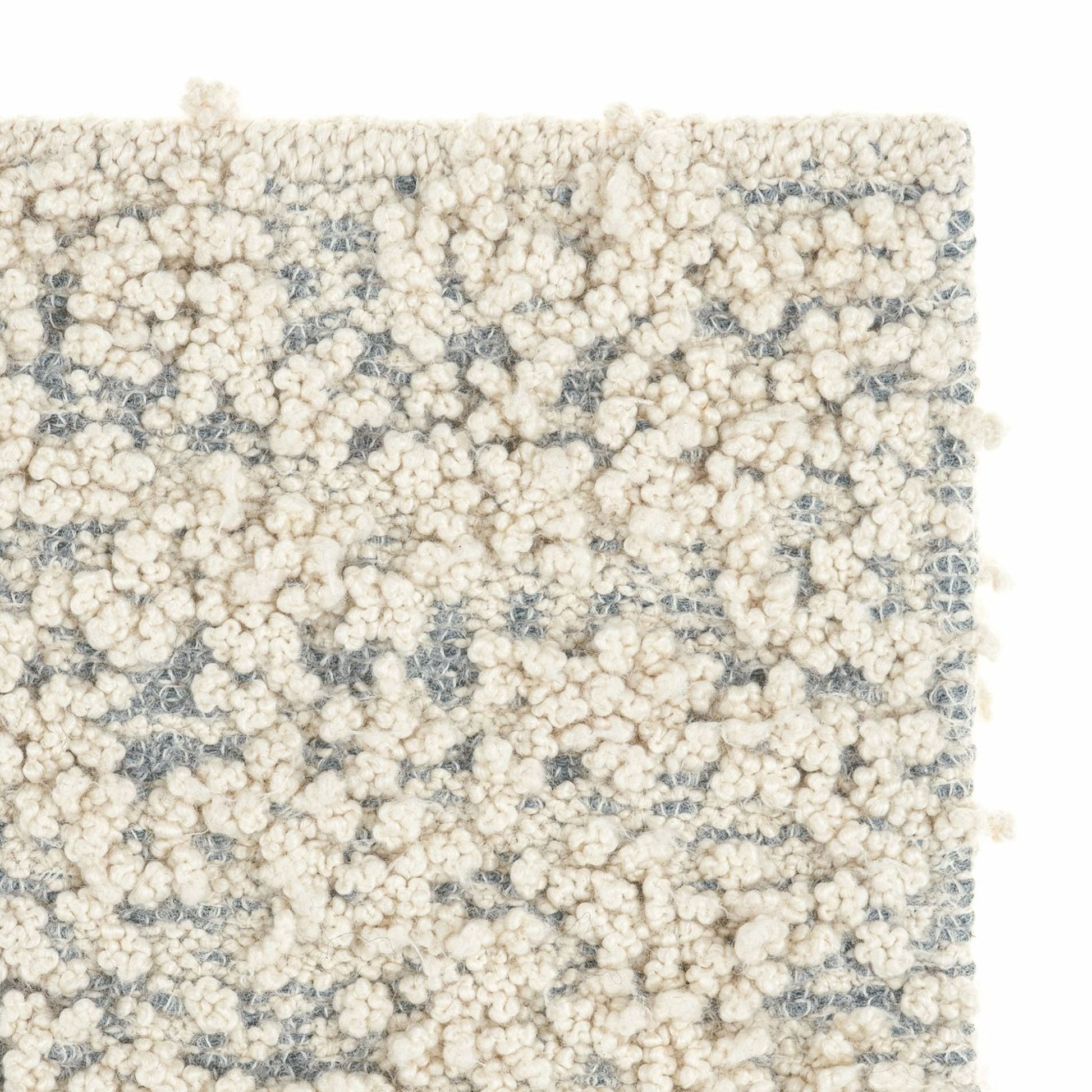 Fiore rug style in cream and dark grey colored boucle weave