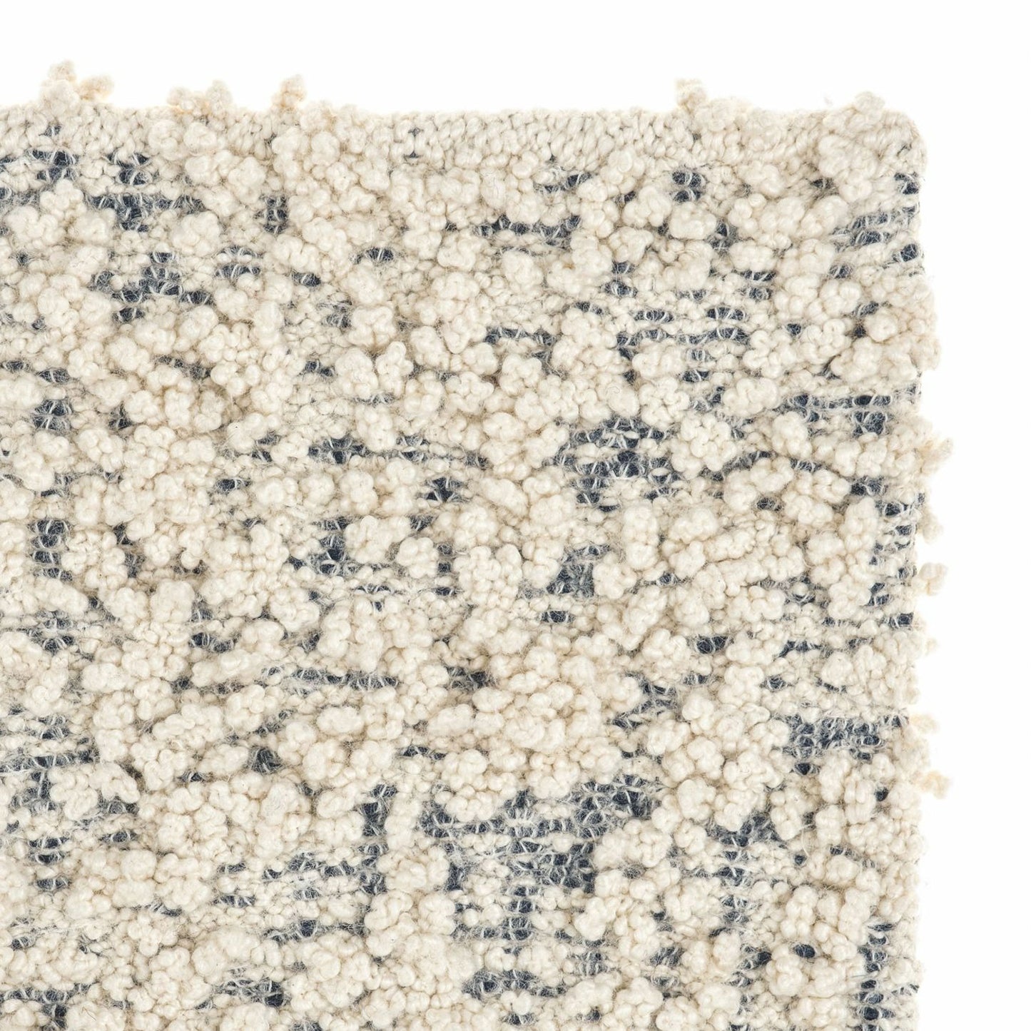 Fiore rug style in cream and dark grey colored boucle weave