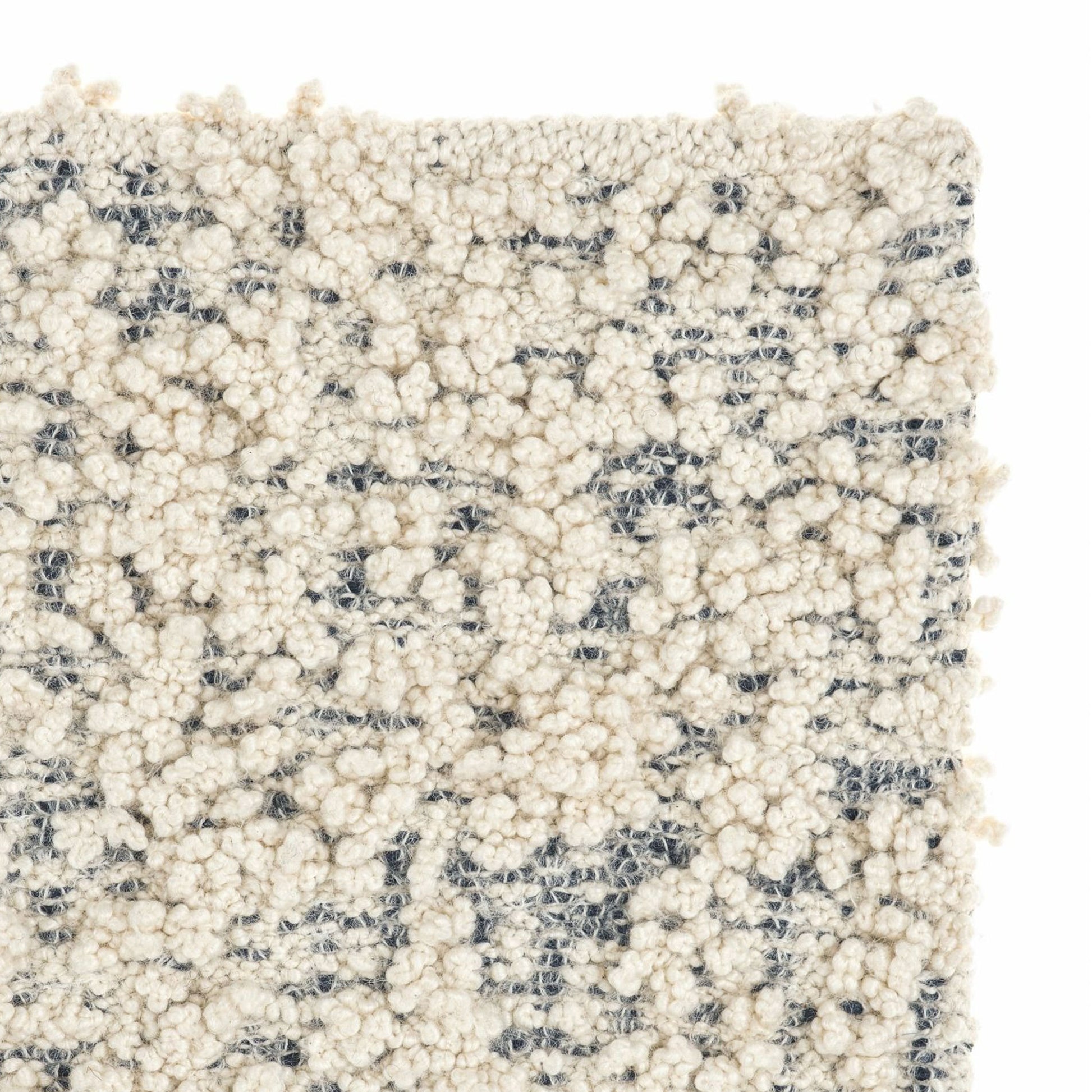 Fiore rug style in cream and dark grey colored boucle weave