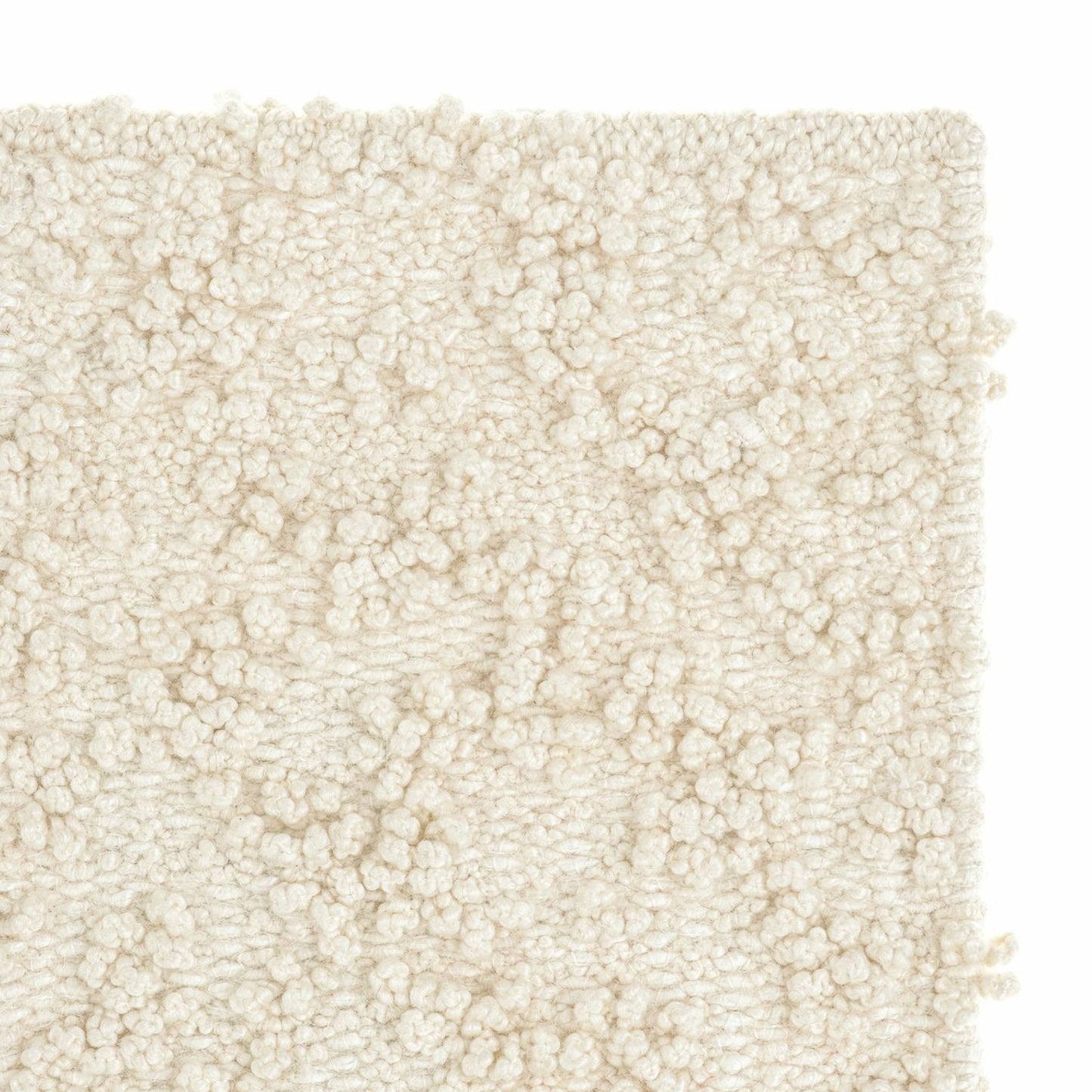 Fiore rug style in cream colored boucle weave