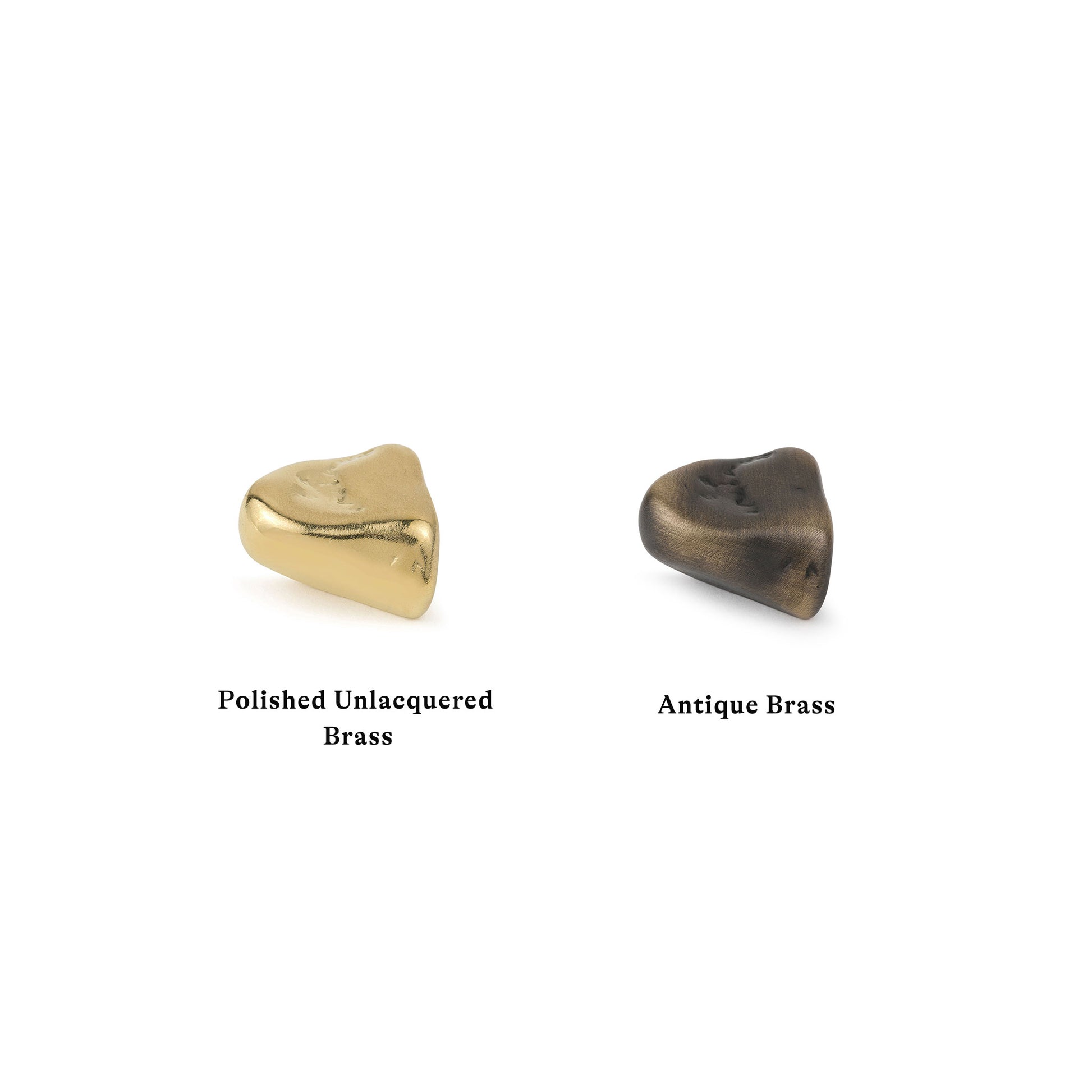 Two brass stone-shaped cabinet knobs, one polished and unlacquered, the other antique brass, on a white background.