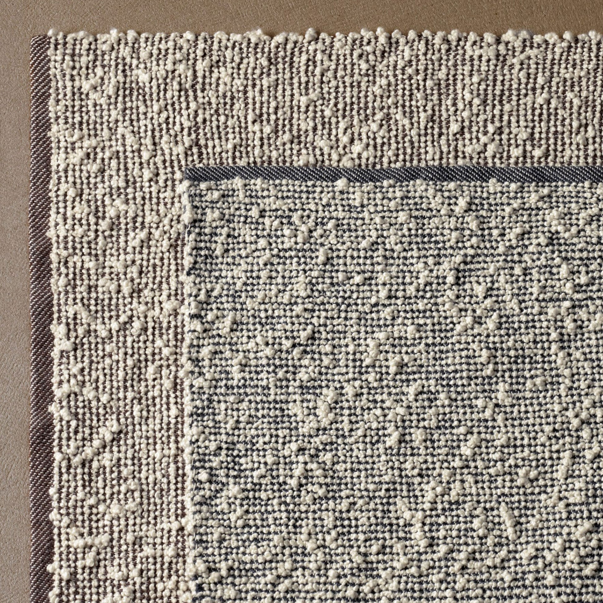 Sanenu rug styles in cream, taupe and grey colored textured boucle weave