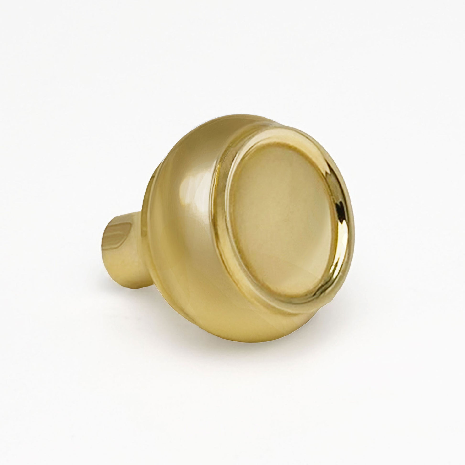 Brass cabinet knob on a white background