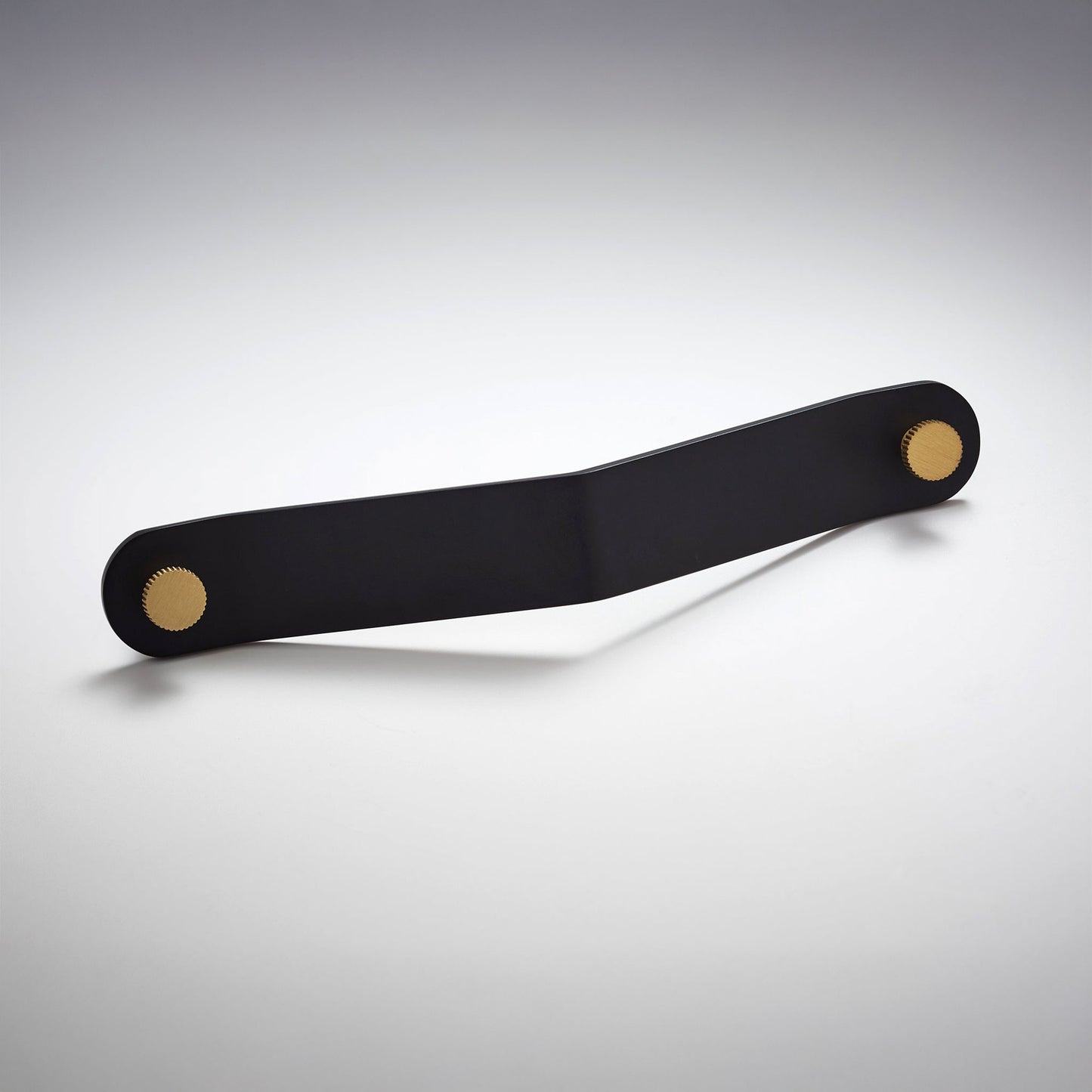 A black polished metal cabinet pull handle with a rectangular bar and circular mounting bases on both ends, on a light gray background.