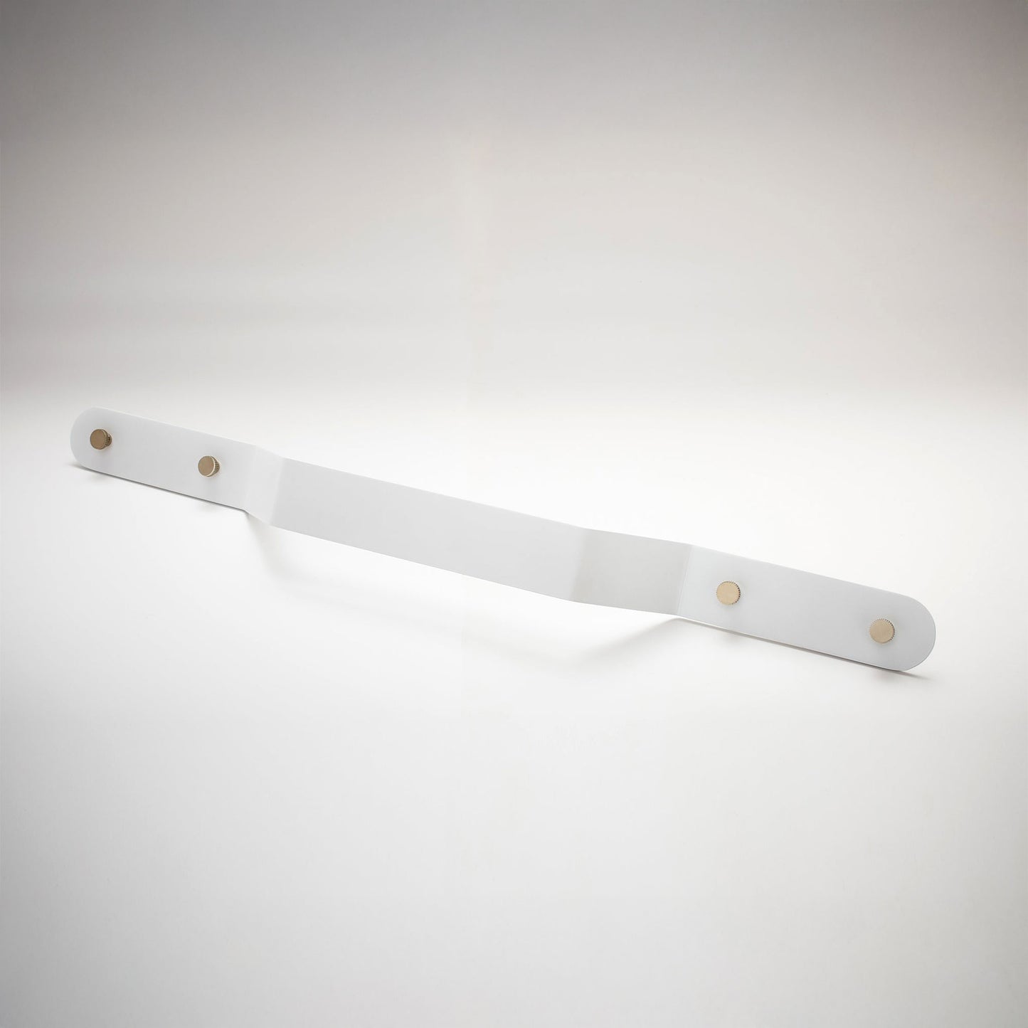 A minimalist, long, white metal cabinet pull handle with two mounting holes, shown on a white background.