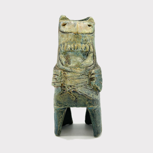 Small Statue of a creature with mottled green glaze