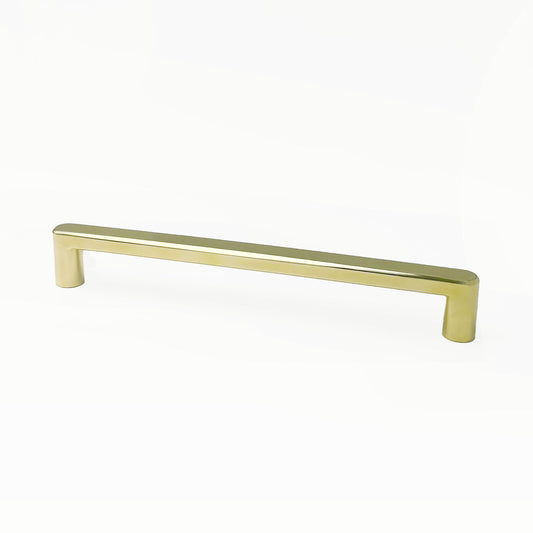 Brass cabinet handle on a white background