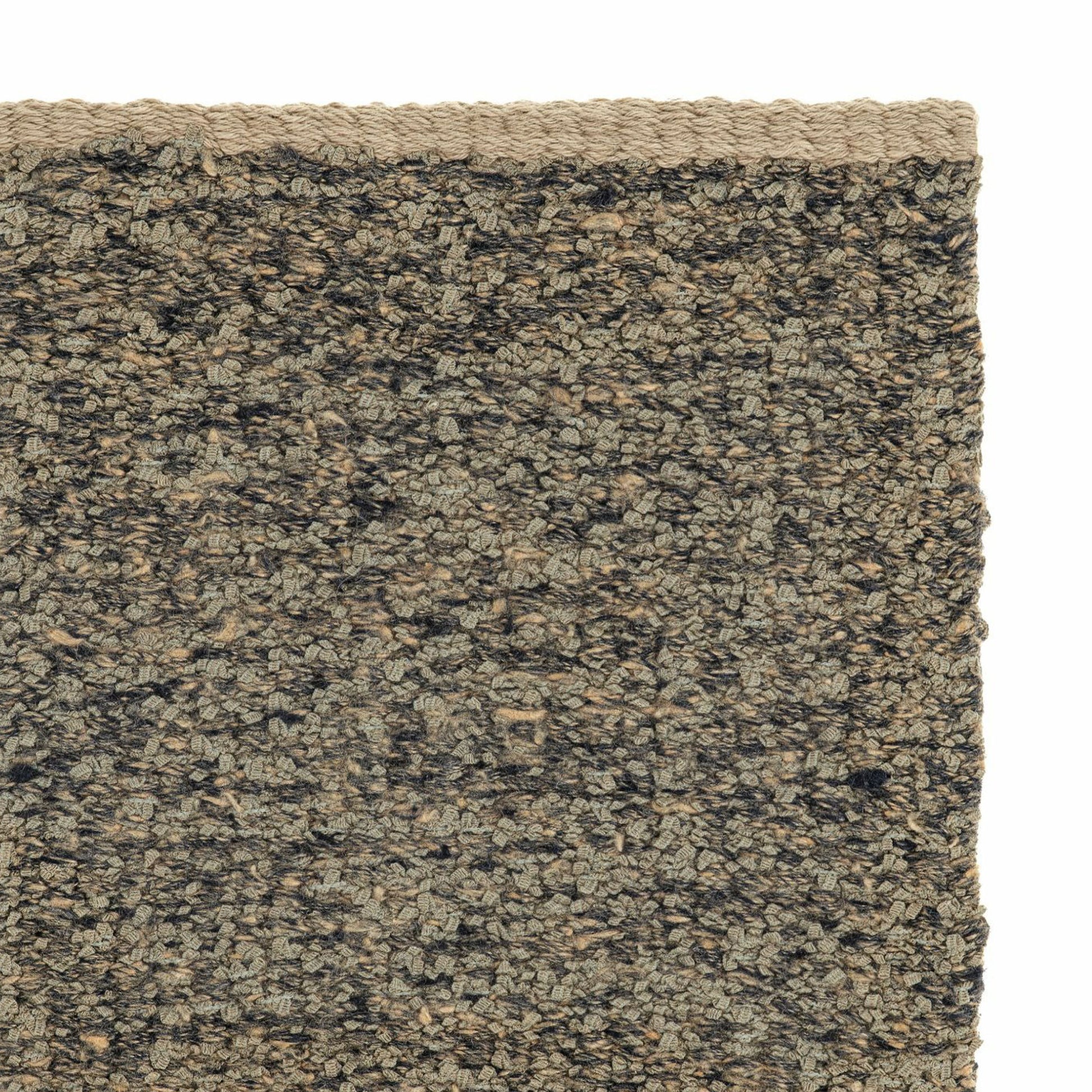 Iris rug style in buff and charcoal colored mottled twisted flat weave