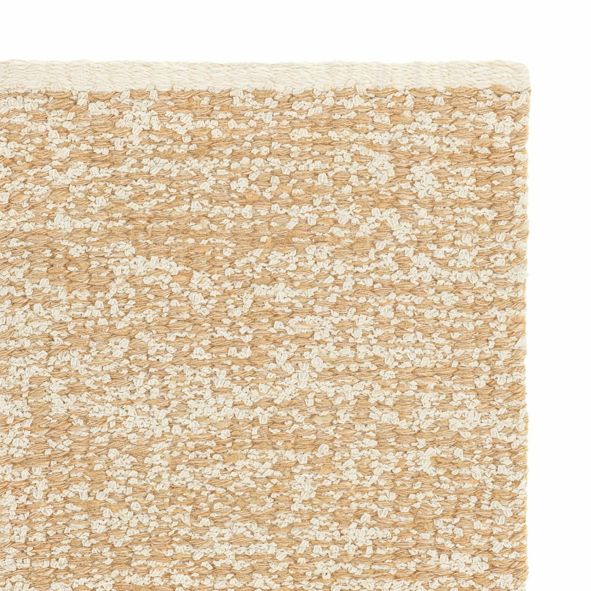 Iris rug style in cream and pale terra cotta colored mottled twisted flat weave