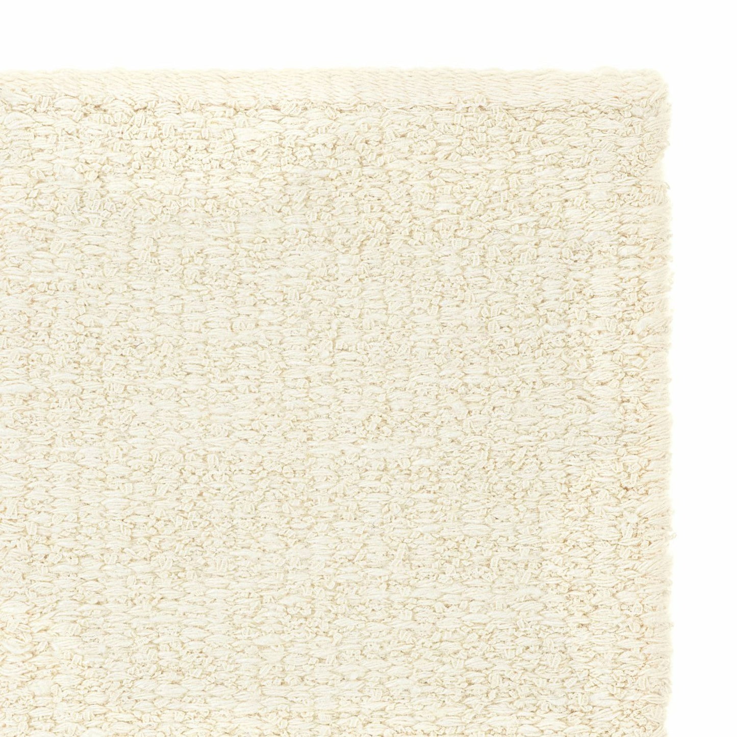 Iris rug style in cream colored mottled twisted flat weave