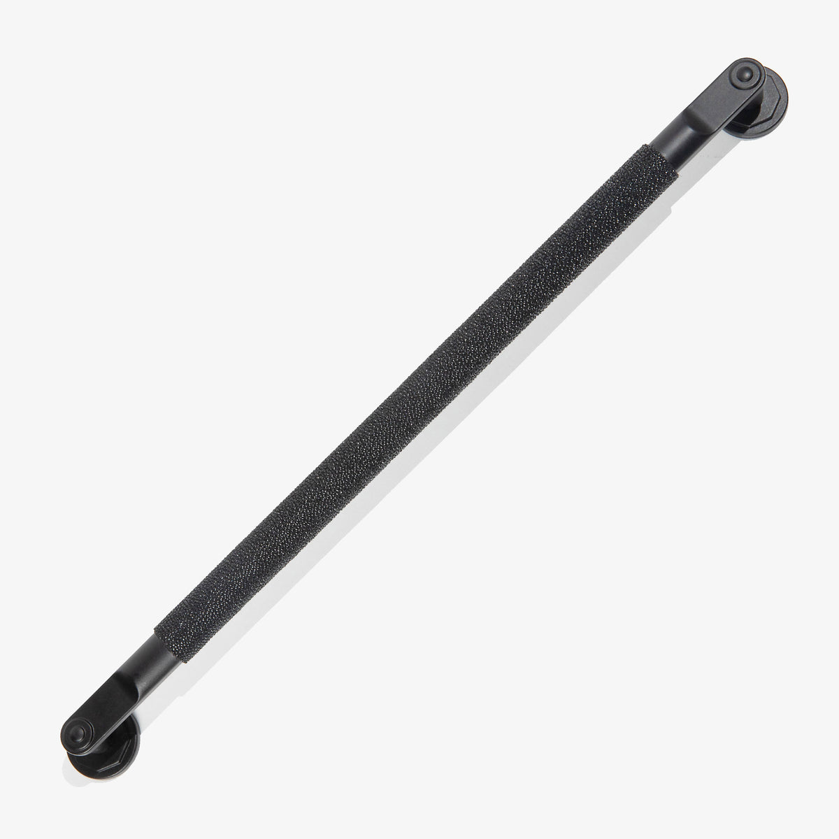 A matte black industrial looking cabinet pull with a m,atte black shagreen grip on a seamless white background