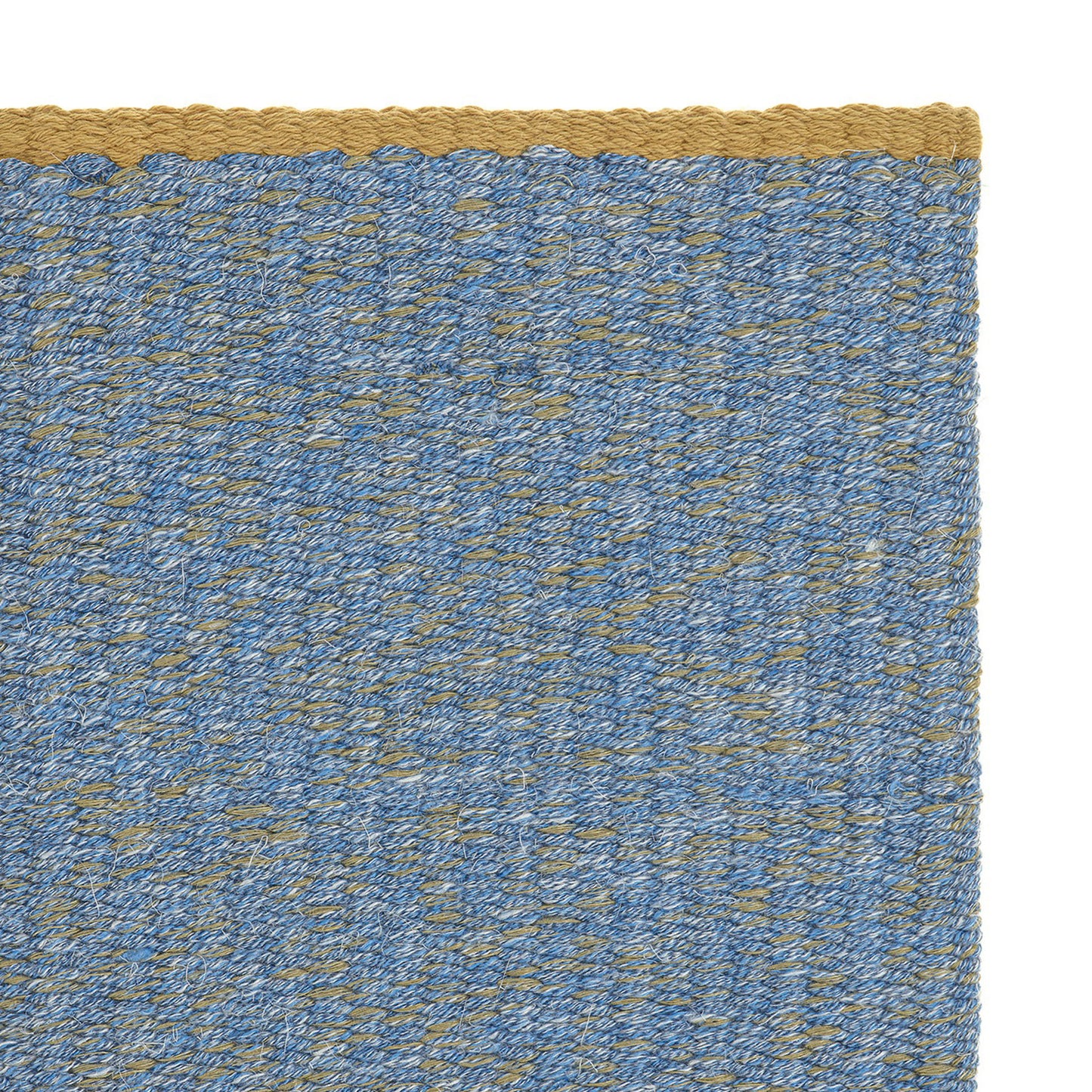 Jaspe rug style in smoke blue and mustard yellow spun flat weave