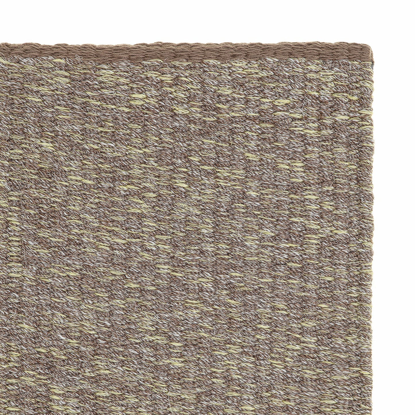 Jaspe rug style in buff and clay colored spun flat weave