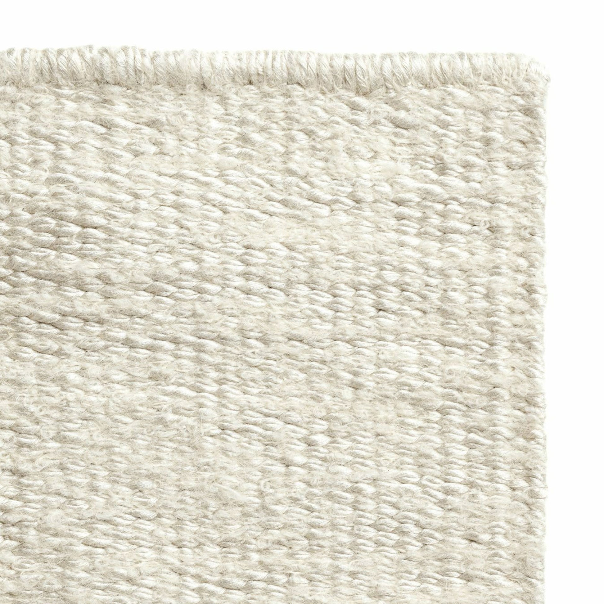 Luce rug style in off white colored mottled twisted flat weave