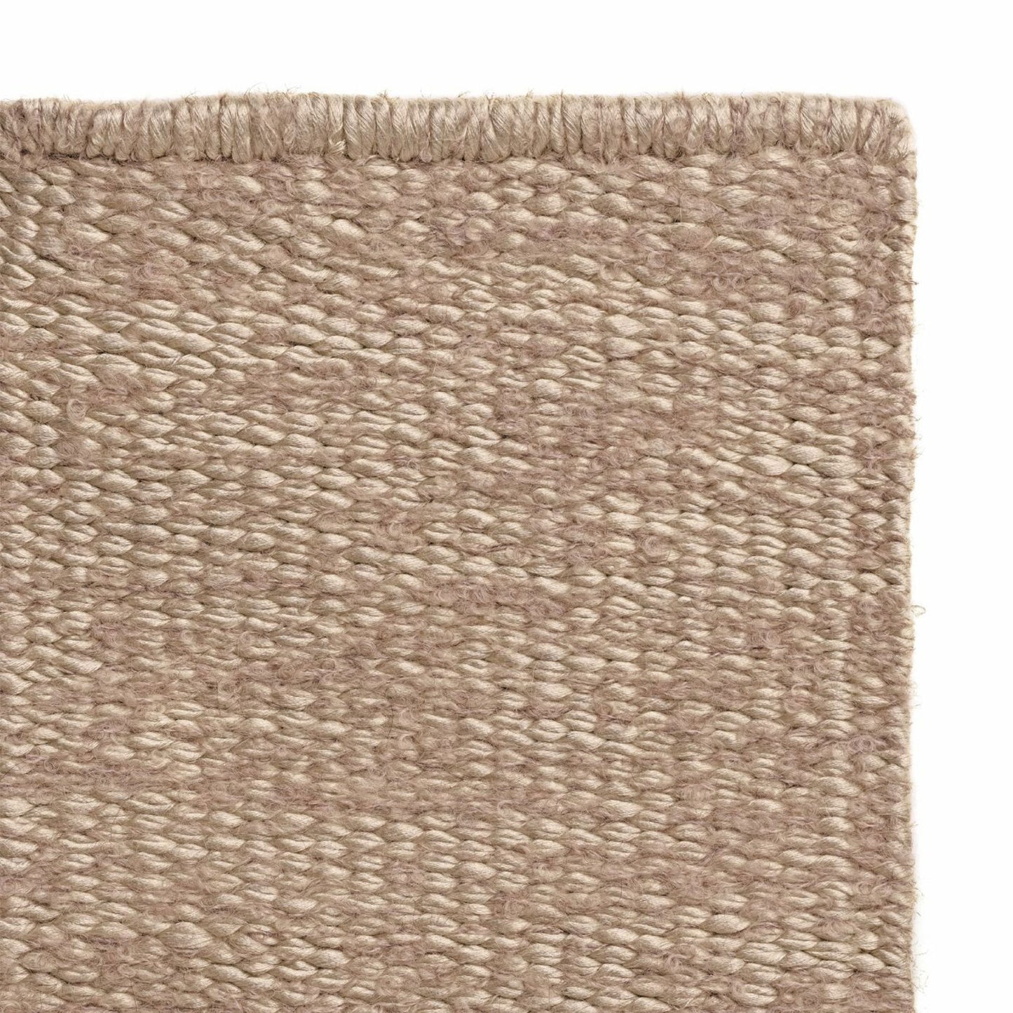 Luce rug style in light terra cotta colored mottled twisted flat weave