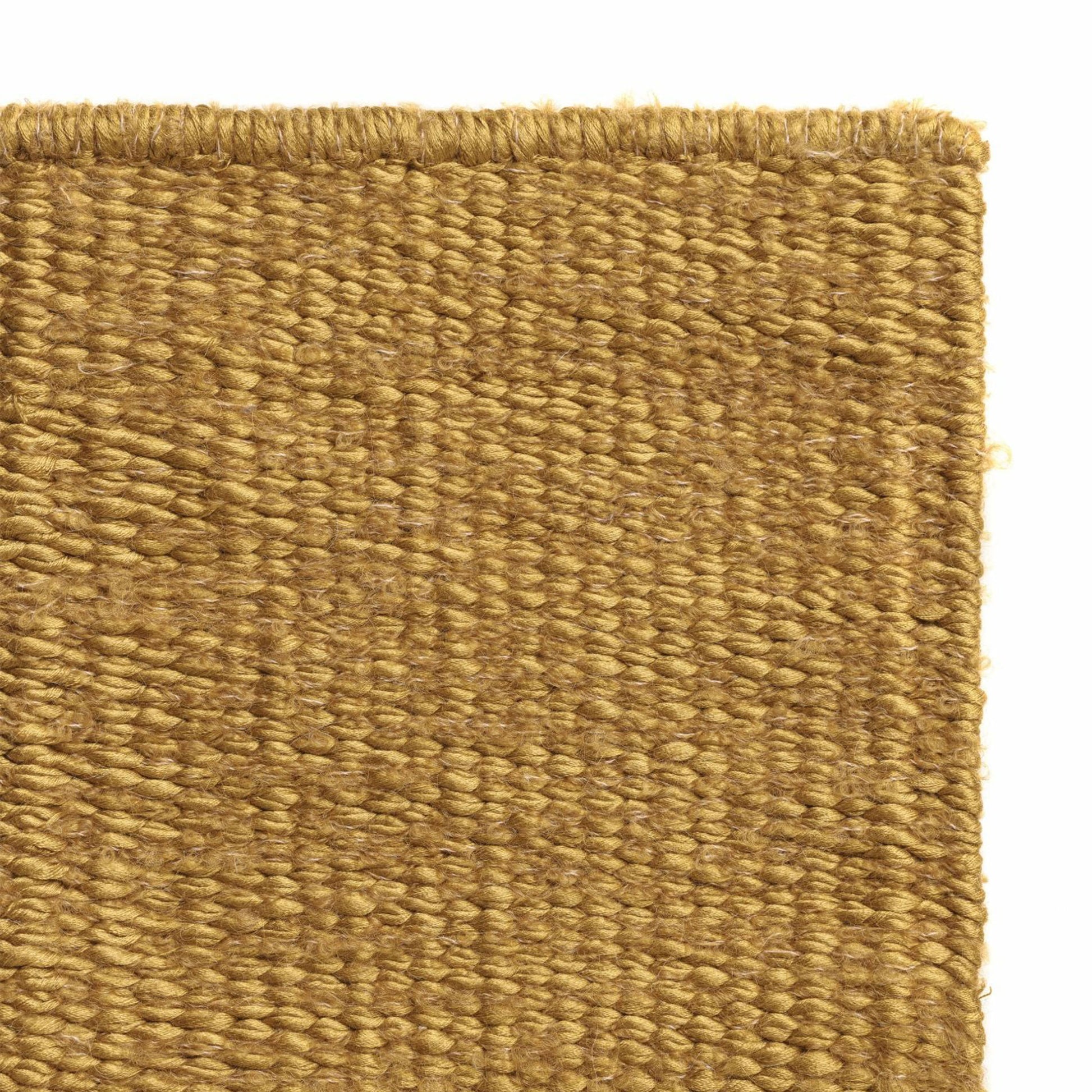 Luce rug style in mustard yellow colored mottled twisted flat weave