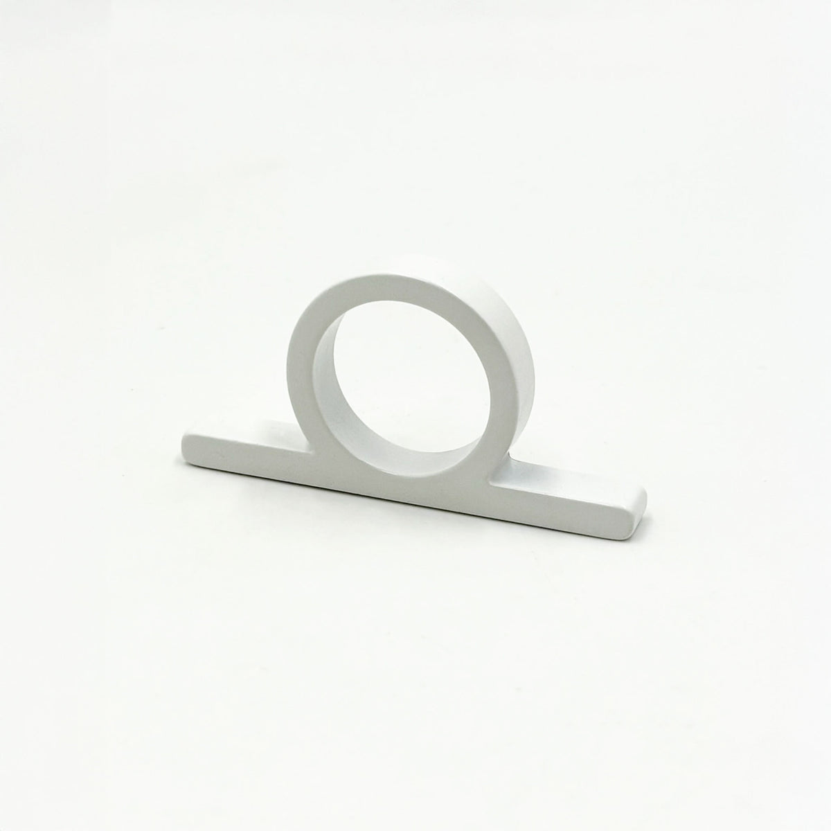 A matte white metal ring pull with a circular loop and flat rectangular base, shown on a plain white background.