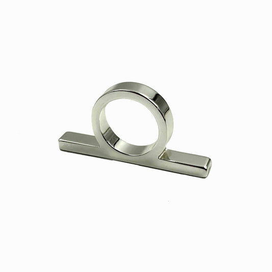 A polished silver metal ring pull with a circular loop and flat rectangular base, shown on a plain white background.