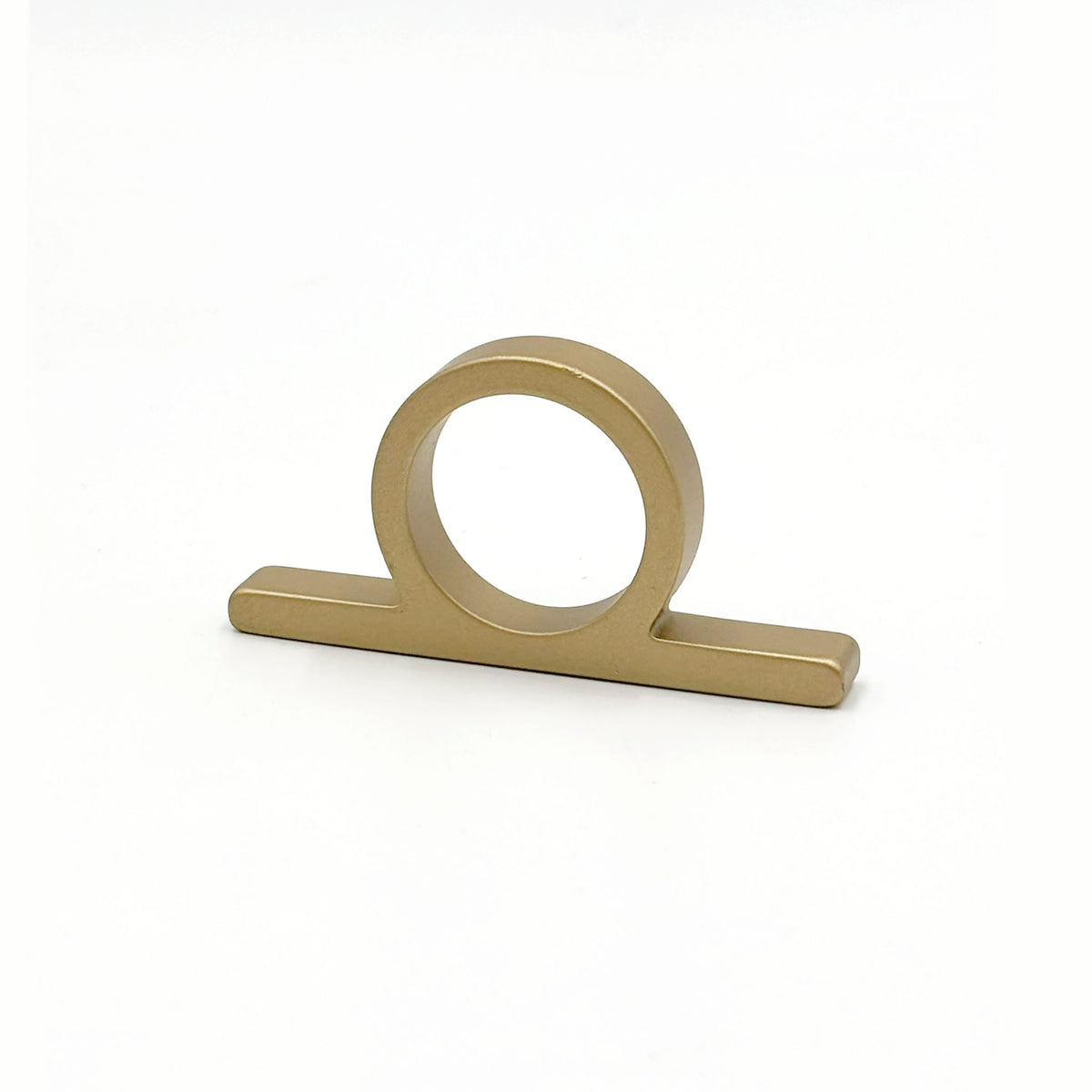 Top View of A satin brass metal ring pull with a circular loop and flat rectangular base, shown on a plain white background.