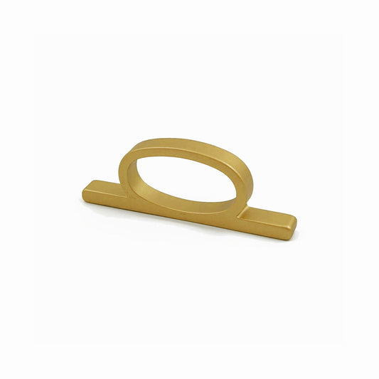A modern bar pull handle with a flat oval loop, finished in a matte brushed brass metal, shown on a clean white background.